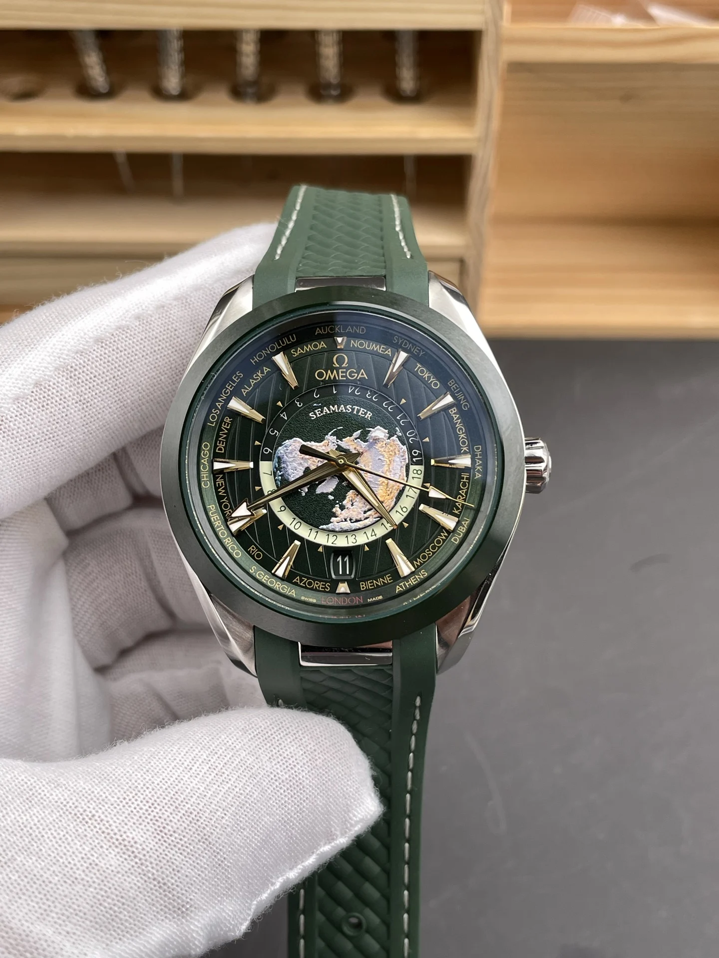 Omega Seamaster Aqua Terra World Time Green Dial — photographed off the sweep