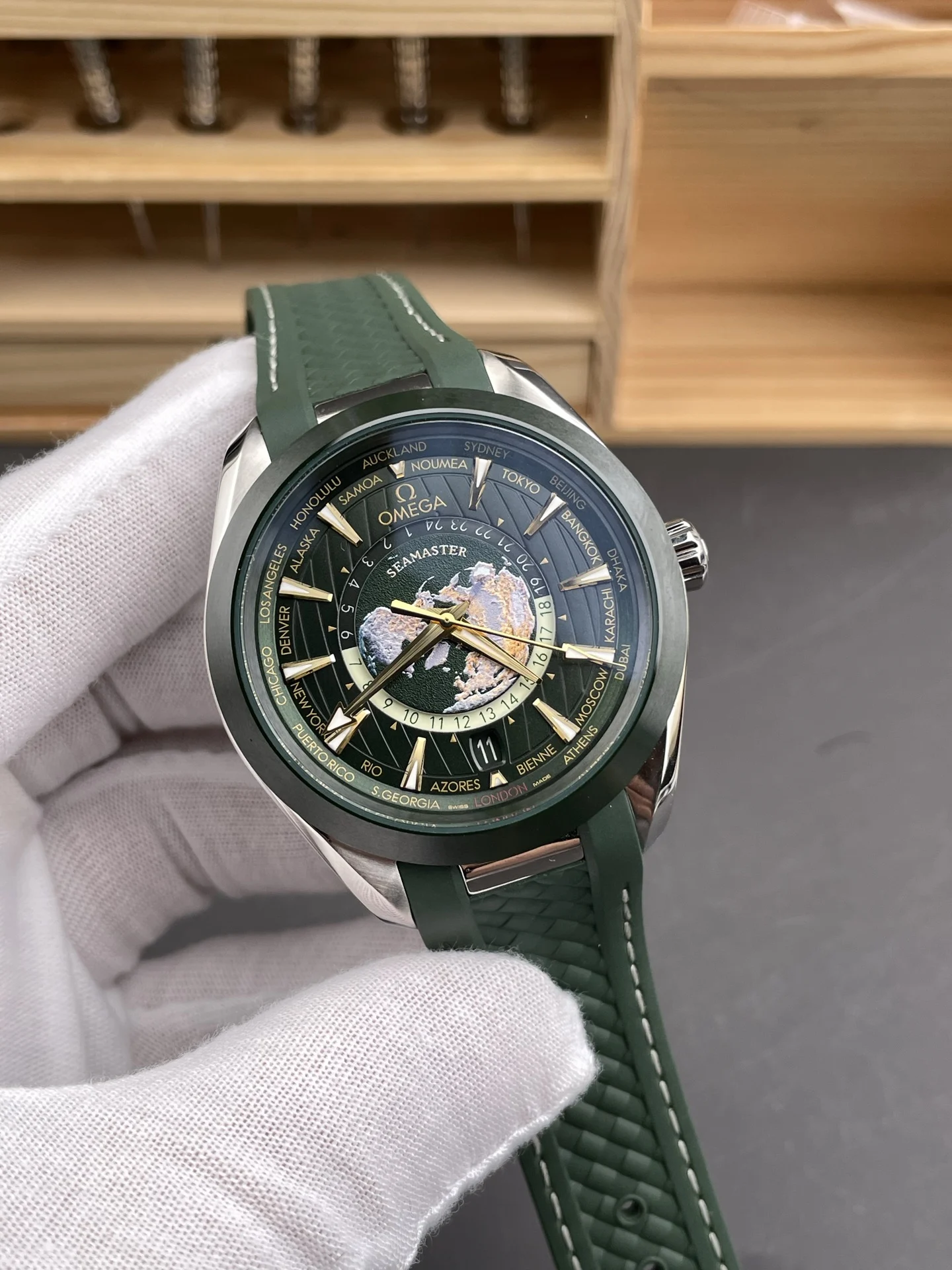 Omega Seamaster Aqua Terra World Time Green Dial — photographed off the sweep