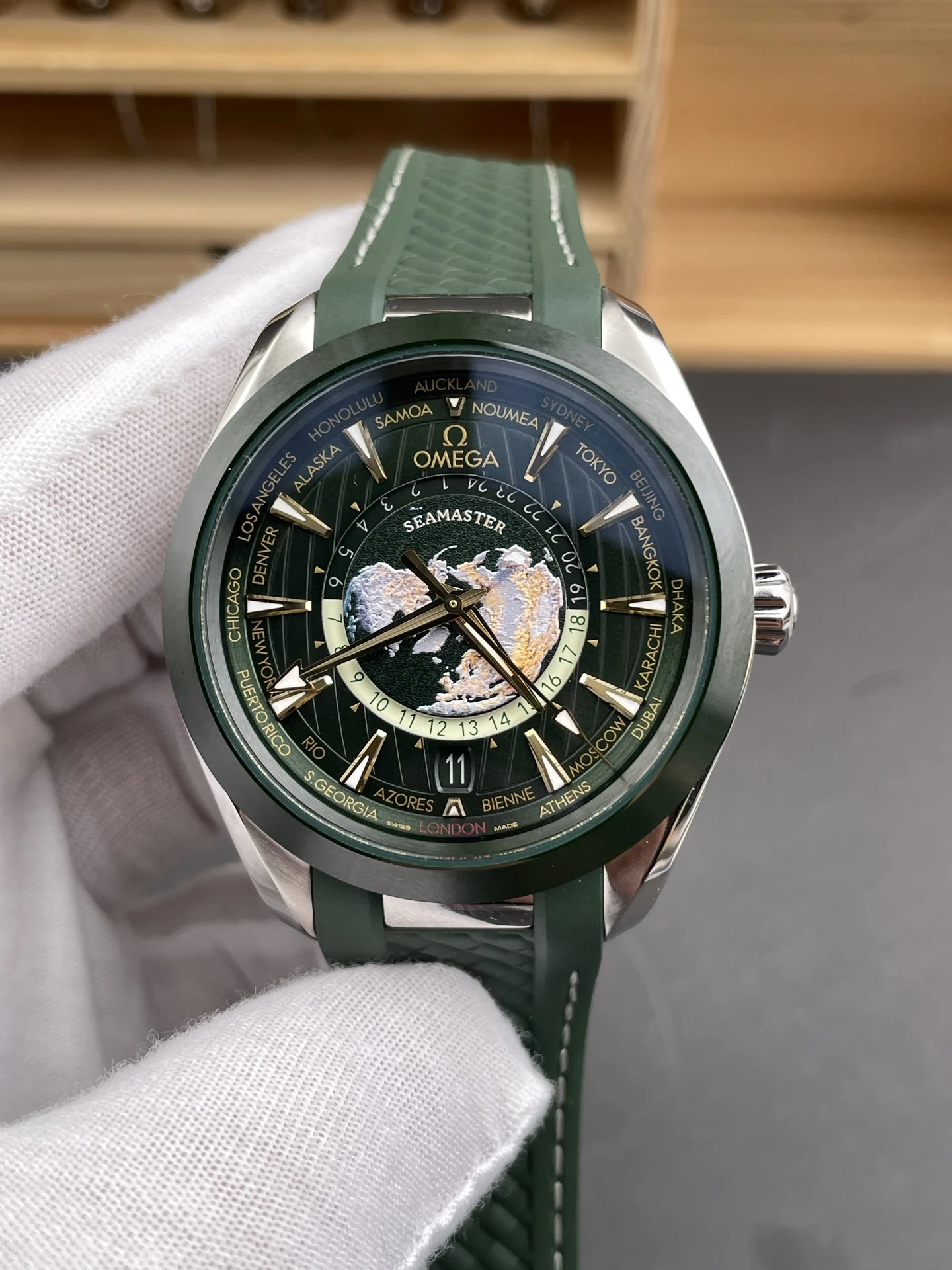 Omega Seamaster Aqua Terra World Time Green Dial — photographed off the sweep