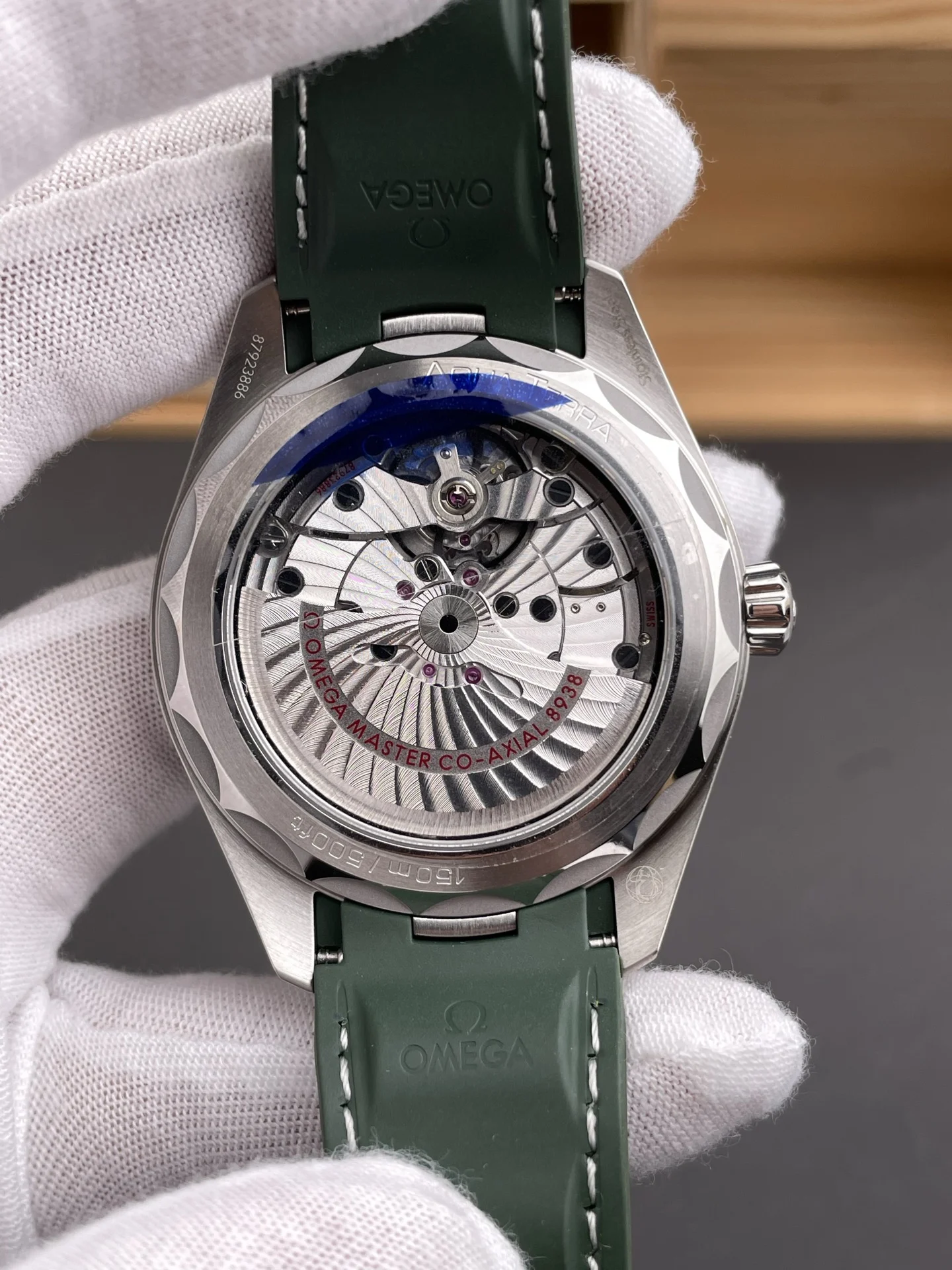Omega Seamaster Aqua Terra World Time Green Dial — photographed off the sweep