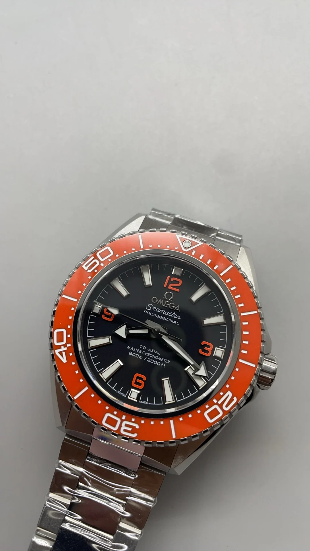 Omega Seamaster Orange Dial 42mm — photographed off the sweep