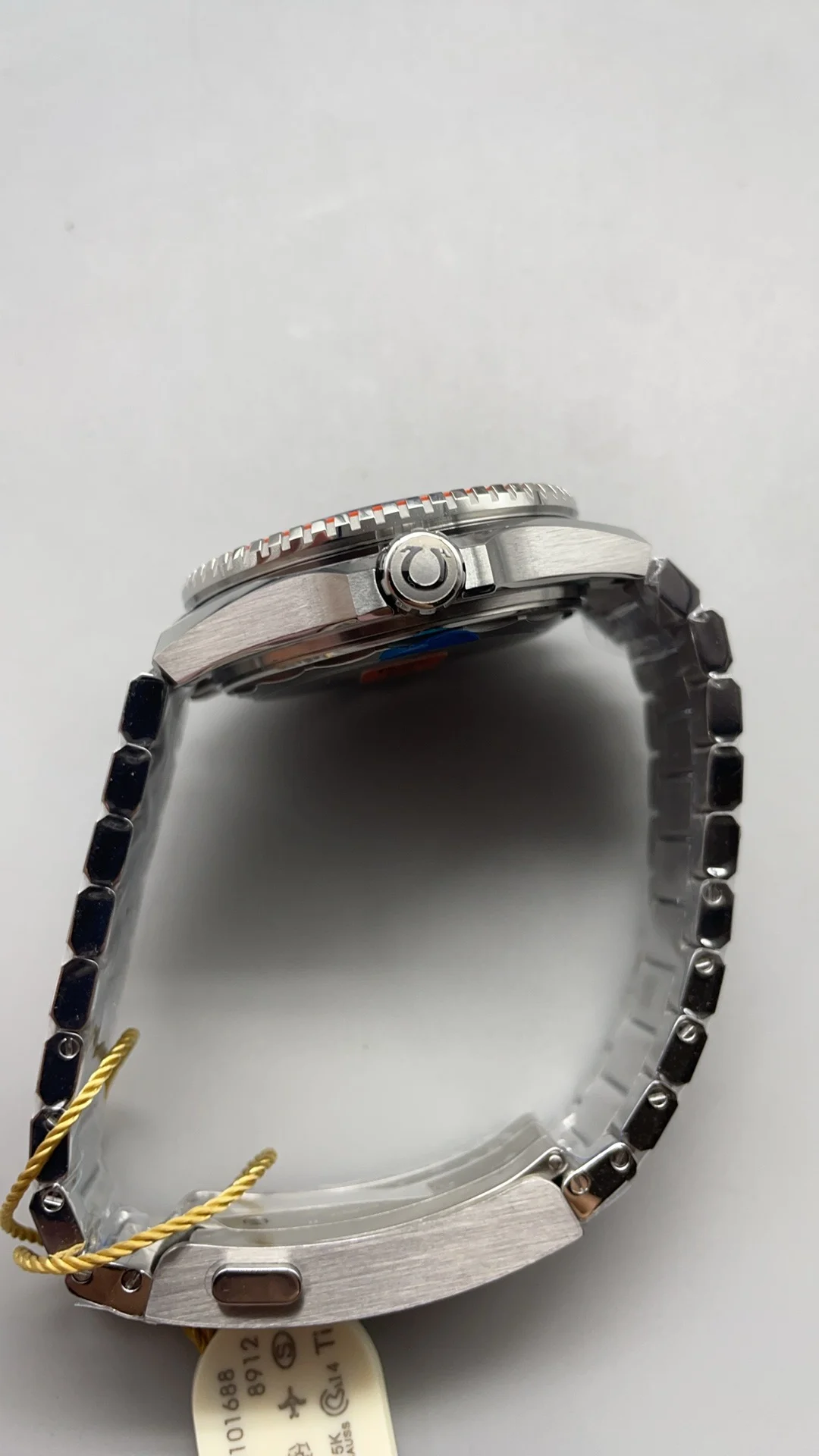 Omega Seamaster Orange Dial 42mm — photographed off the sweep