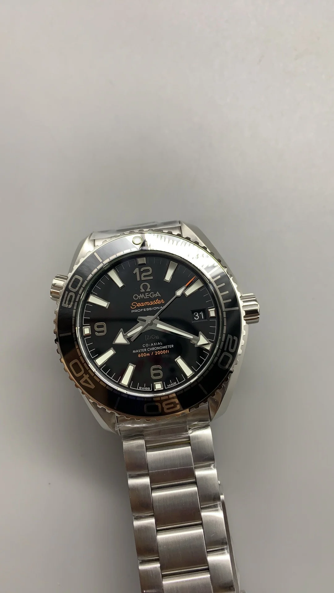 Omega Seamaster Planet Ocean 39.5mm — photographed off the sweep