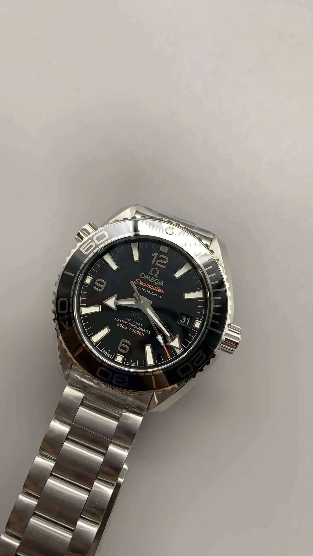 Omega Seamaster Planet Ocean 39.5mm — photographed off the sweep