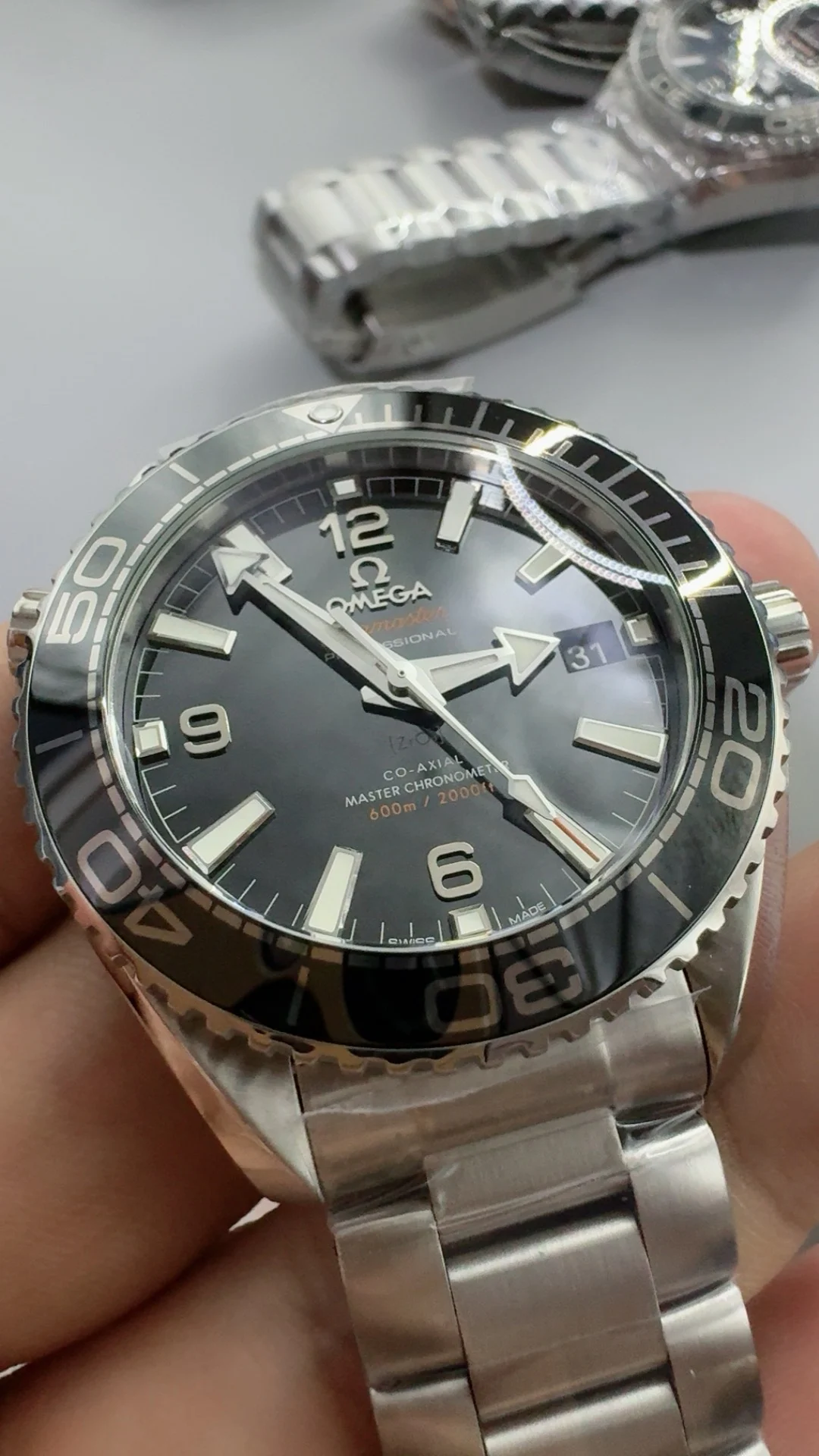 Omega Seamaster Planet Ocean 39.5mm — photographed off the sweep