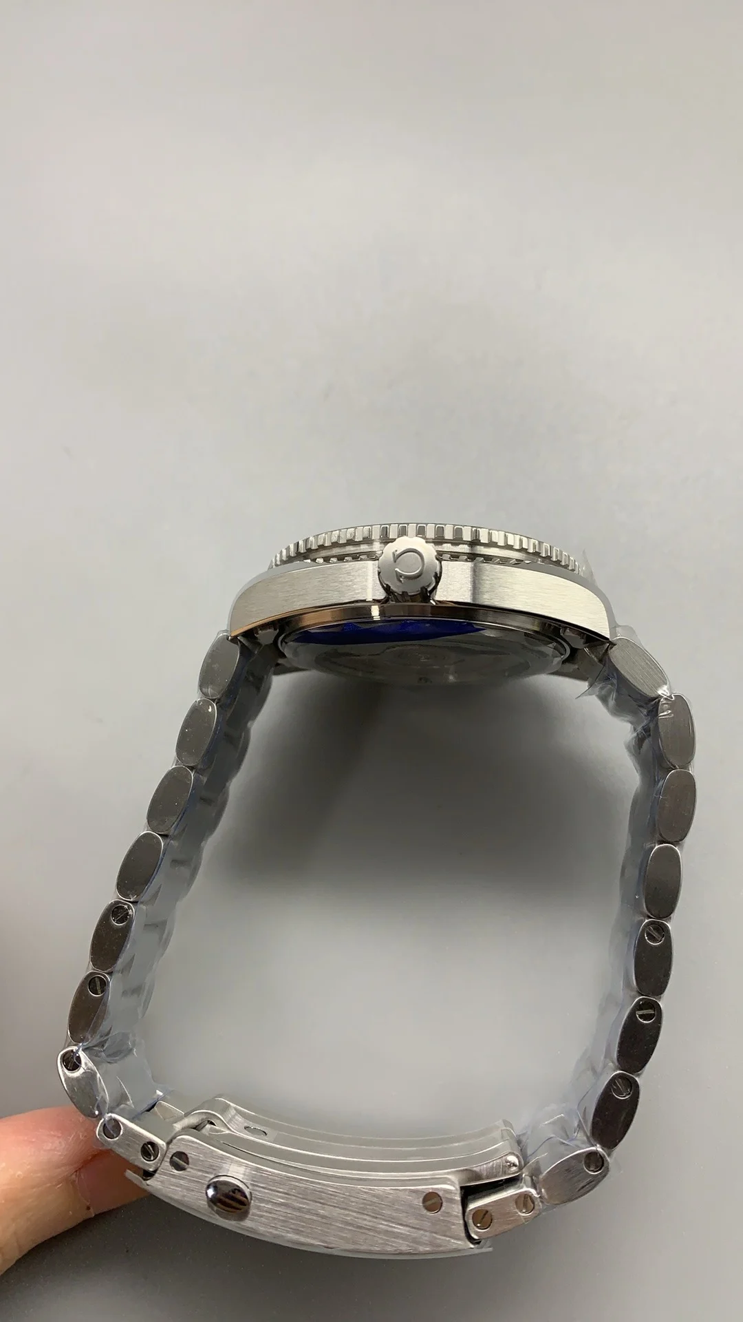 Omega Seamaster Planet Ocean 39.5mm — photographed off the sweep
