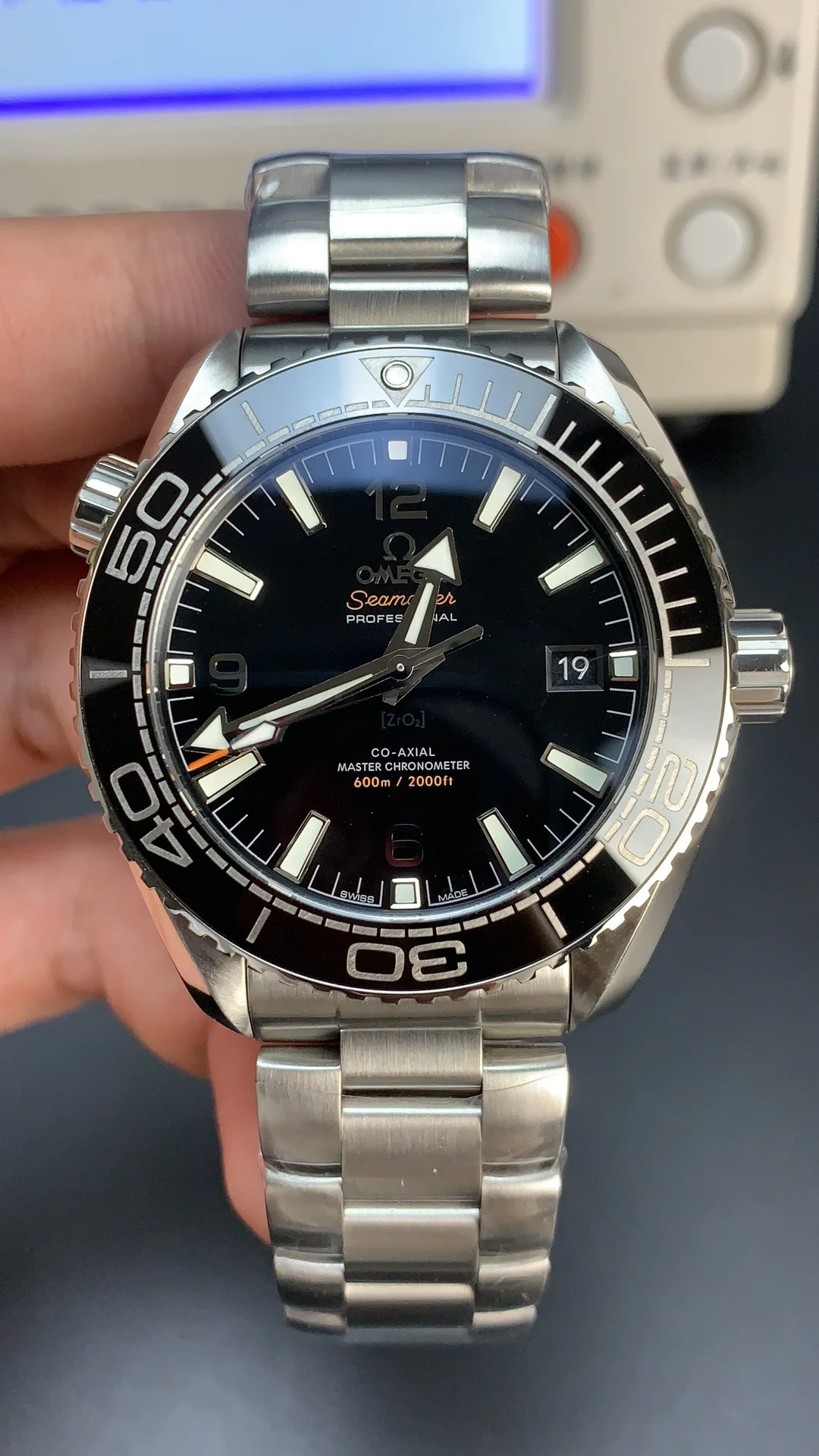 Omega Seamaster Planet Ocean — photographed off the sweep