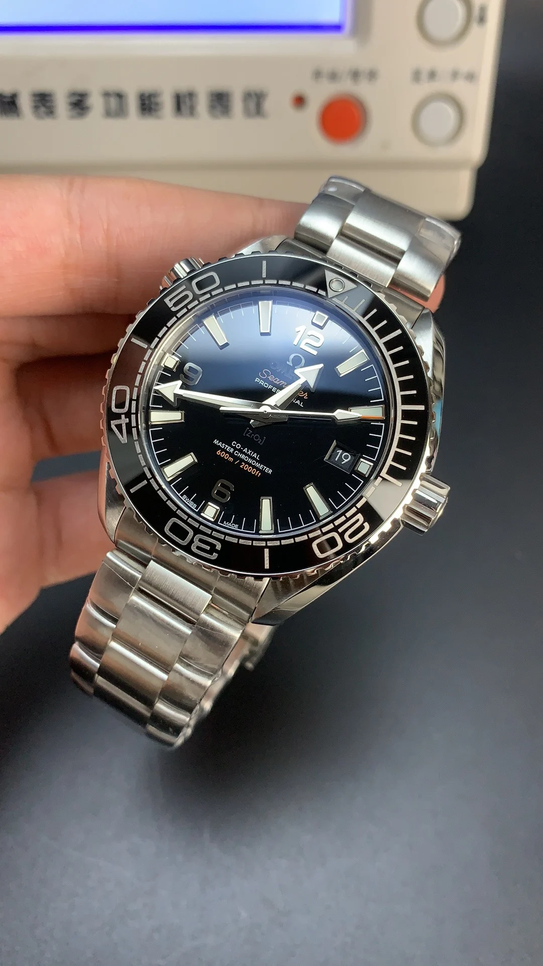 Omega Seamaster Planet Ocean — photographed off the sweep