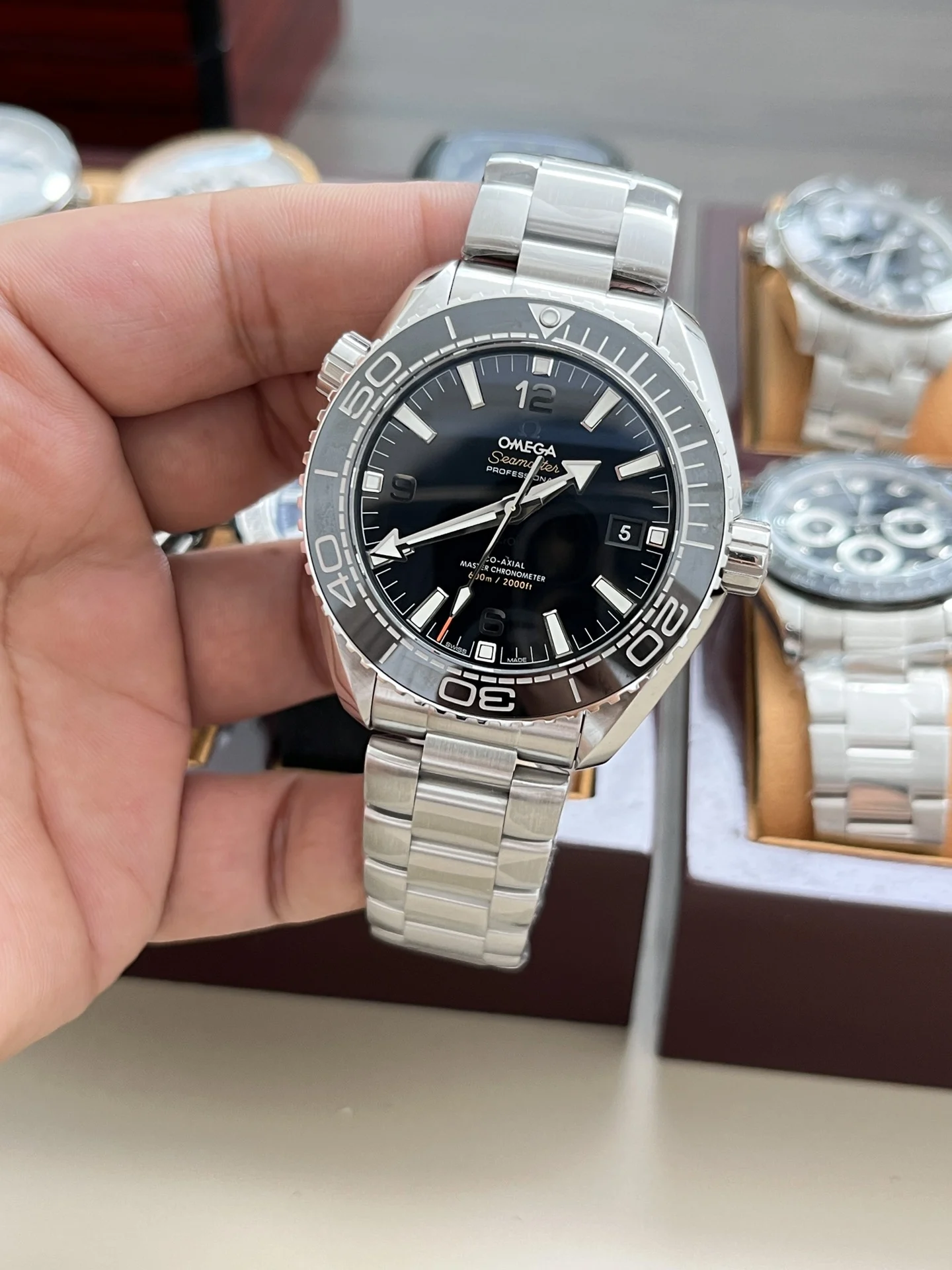 Omega Seamaster Planet Ocean 43.5mm — photographed off the sweep