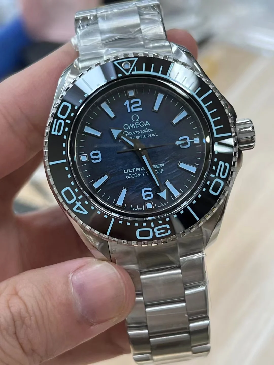 Omega Seamaster Planet Ocean — photographed off the sweep