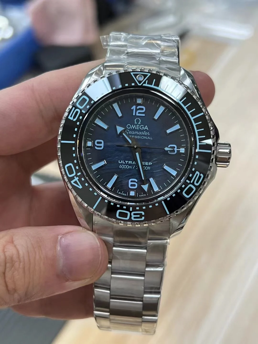 Omega Seamaster Planet Ocean — photographed off the sweep