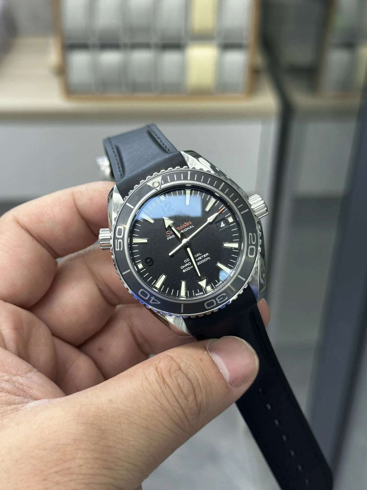 Omega Seamaster Planet Ocean — photographed off the sweep