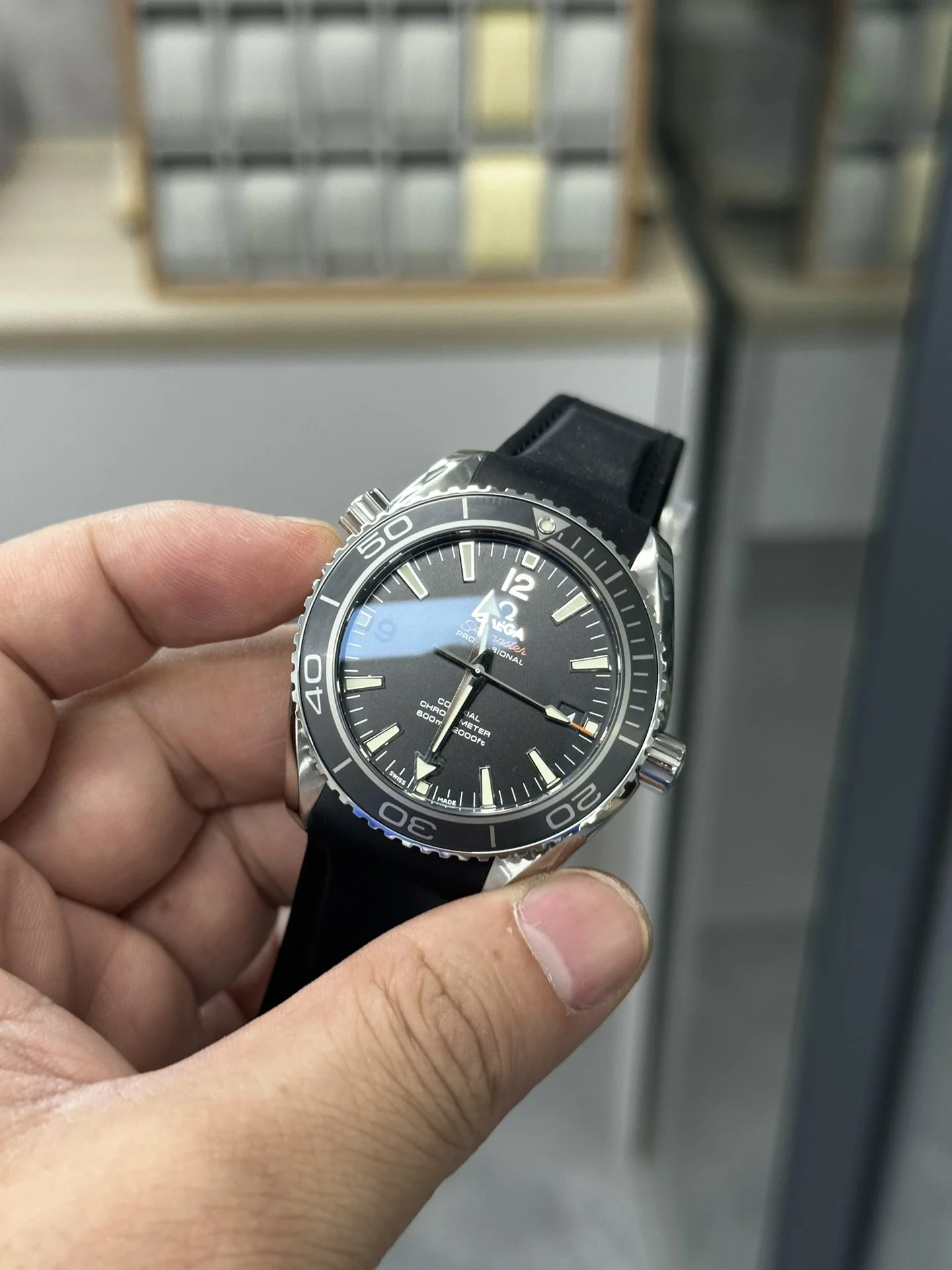 Omega Seamaster Planet Ocean — photographed off the sweep