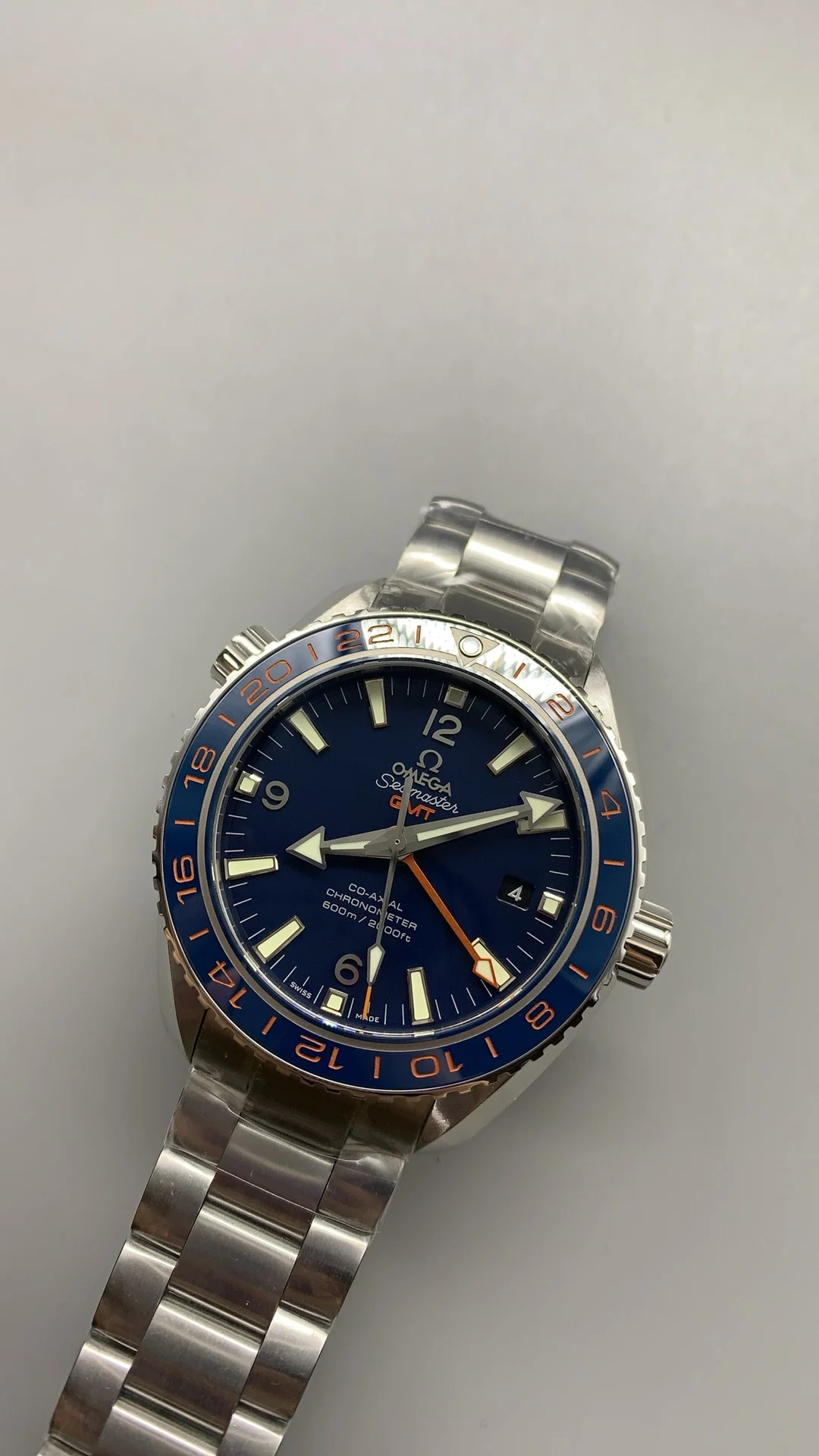Omega Seamaster Planet Ocean Blue Dial — photographed off the sweep