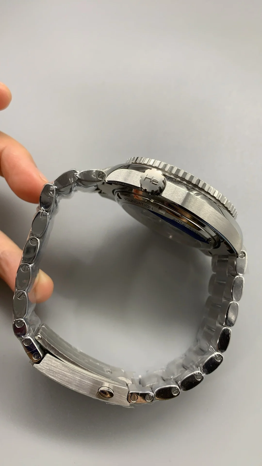 Omega Seamaster Planet Ocean Blue Dial — photographed off the sweep