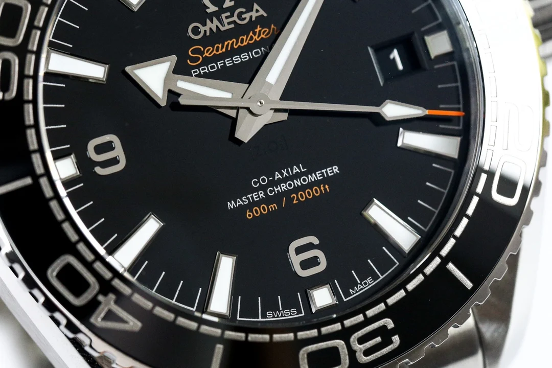 Omega Seamaster Planet Ocean Ceramic 215.30.44.21.03.001 — photographed off the sweep