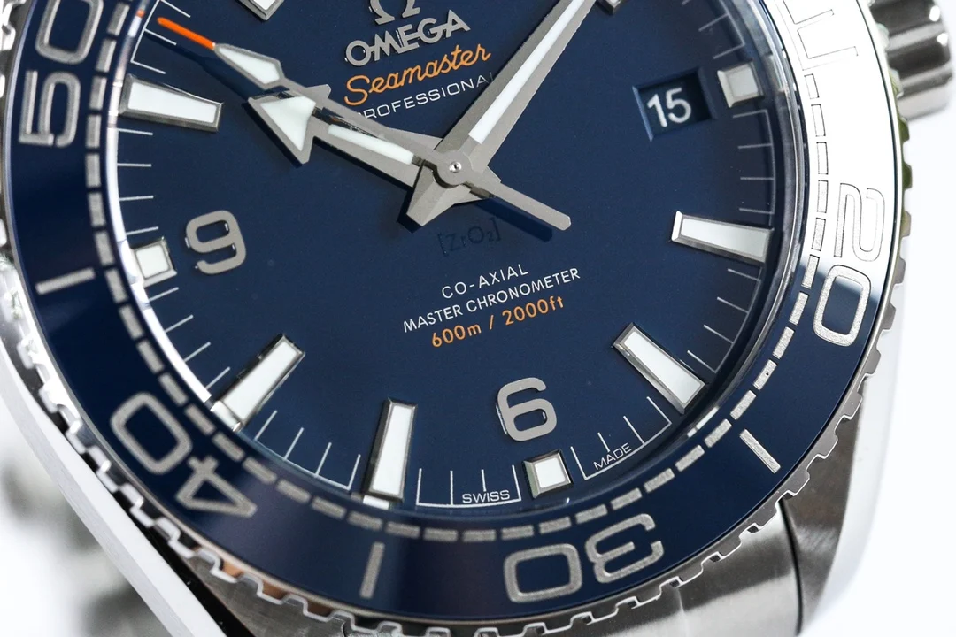 Omega Seamaster Planet Ocean Ceramic Blue Dial 215.30.44.21.03.001 — photographed off the sweep