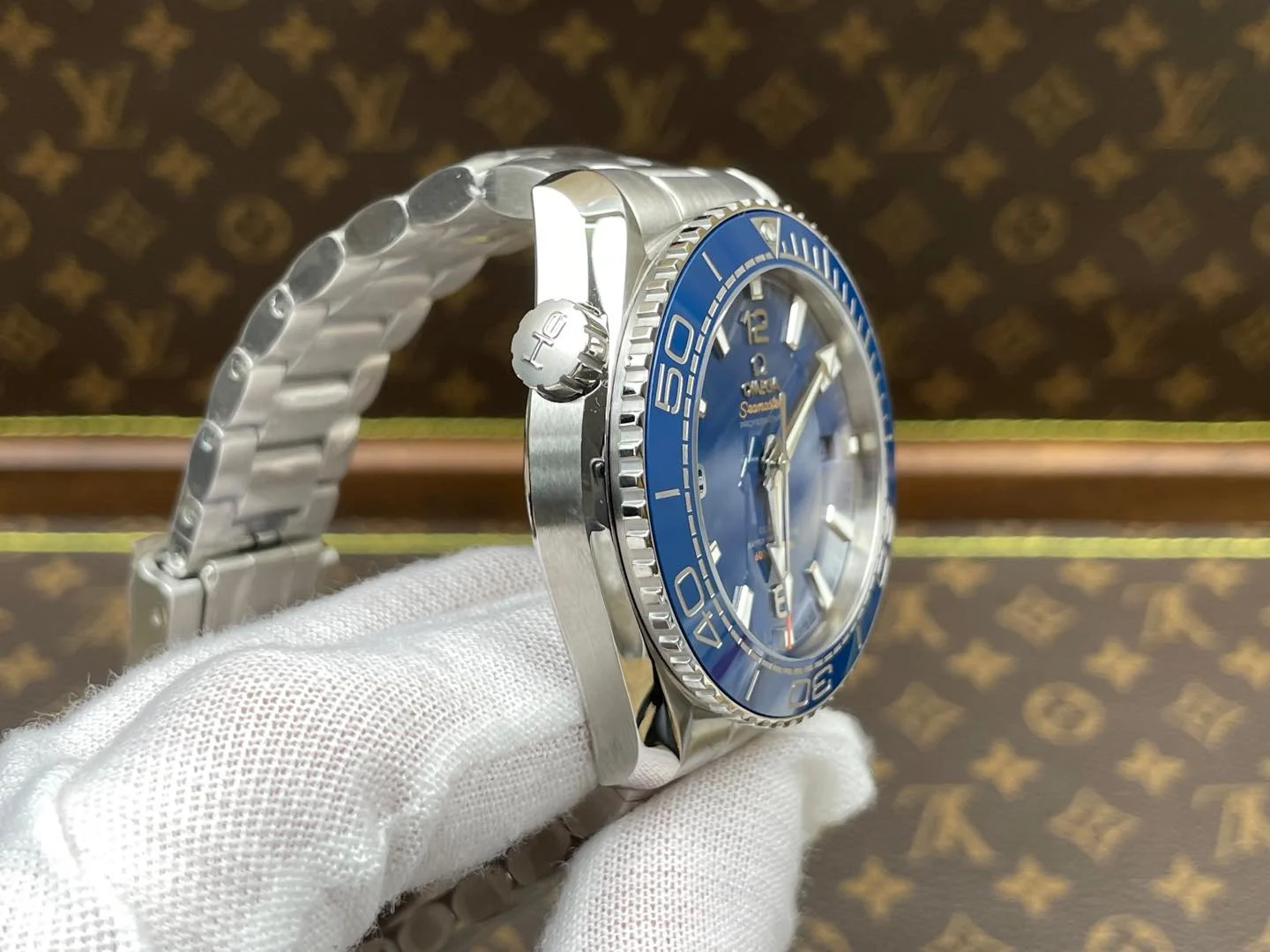Omega Seamaster Planet Ocean Ceramic Blue Dial — photographed off the sweep