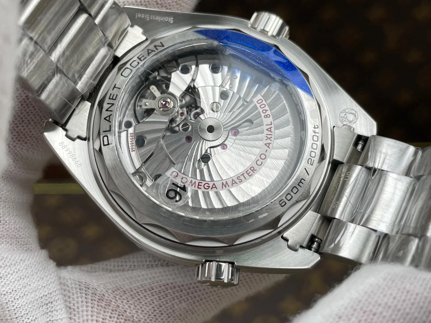 Omega Seamaster Planet Ocean Ceramic Blue Dial — photographed off the sweep