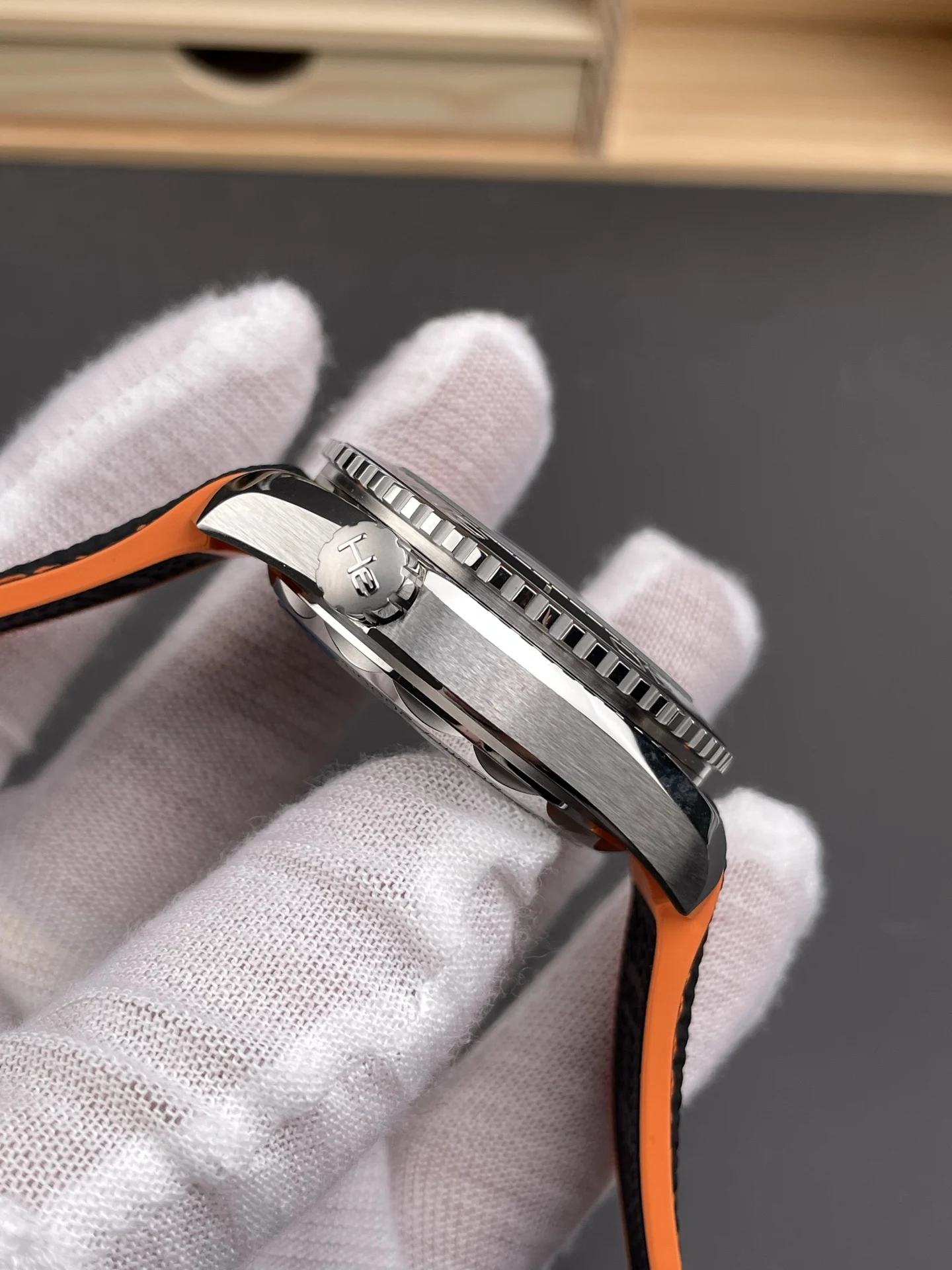 Omega Seamaster Planet Ocean Orange Dial 43.5mm — photographed off the sweep