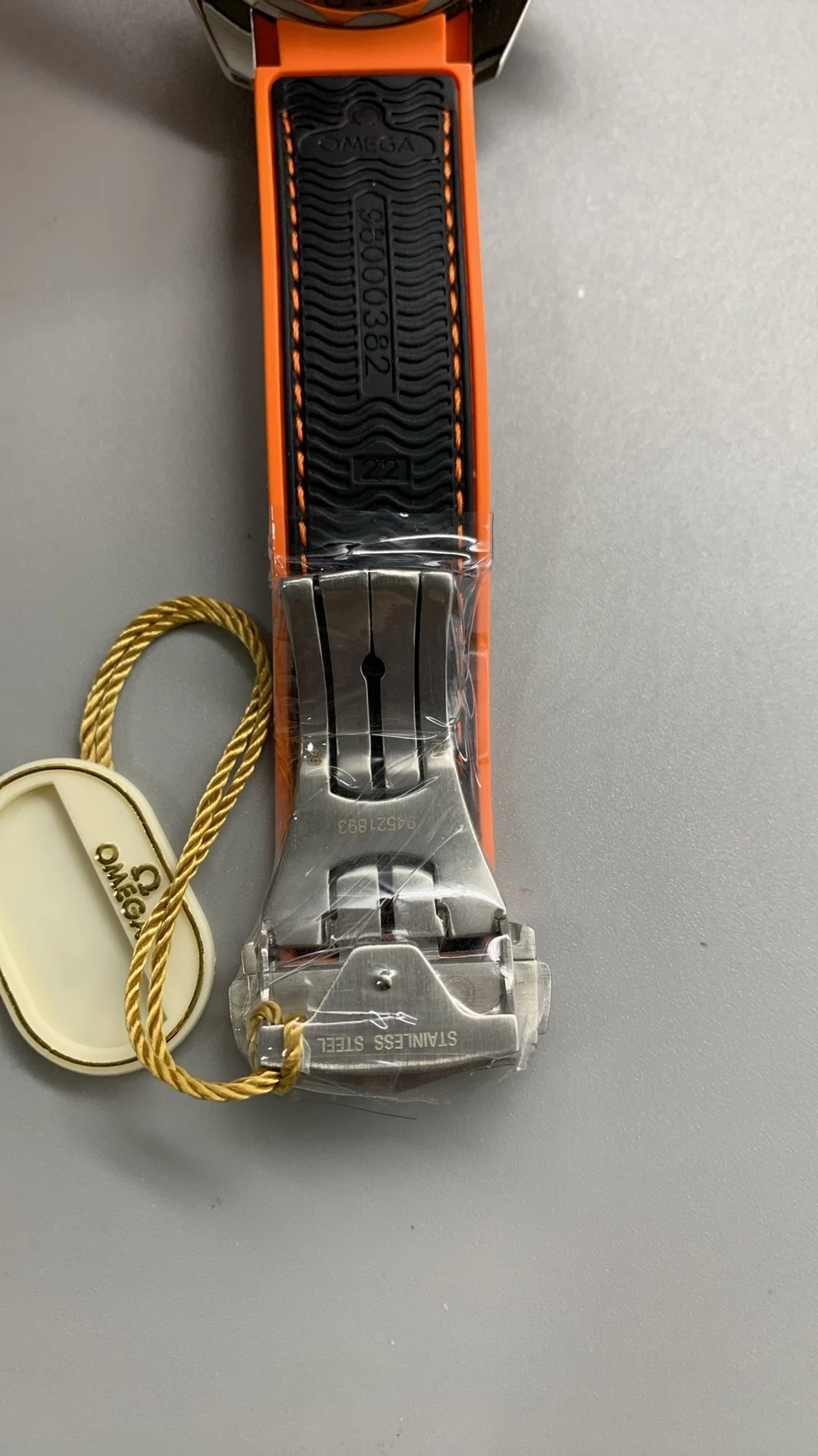 Omega Seamaster Planet Ocean Orange Dial — photographed off the sweep