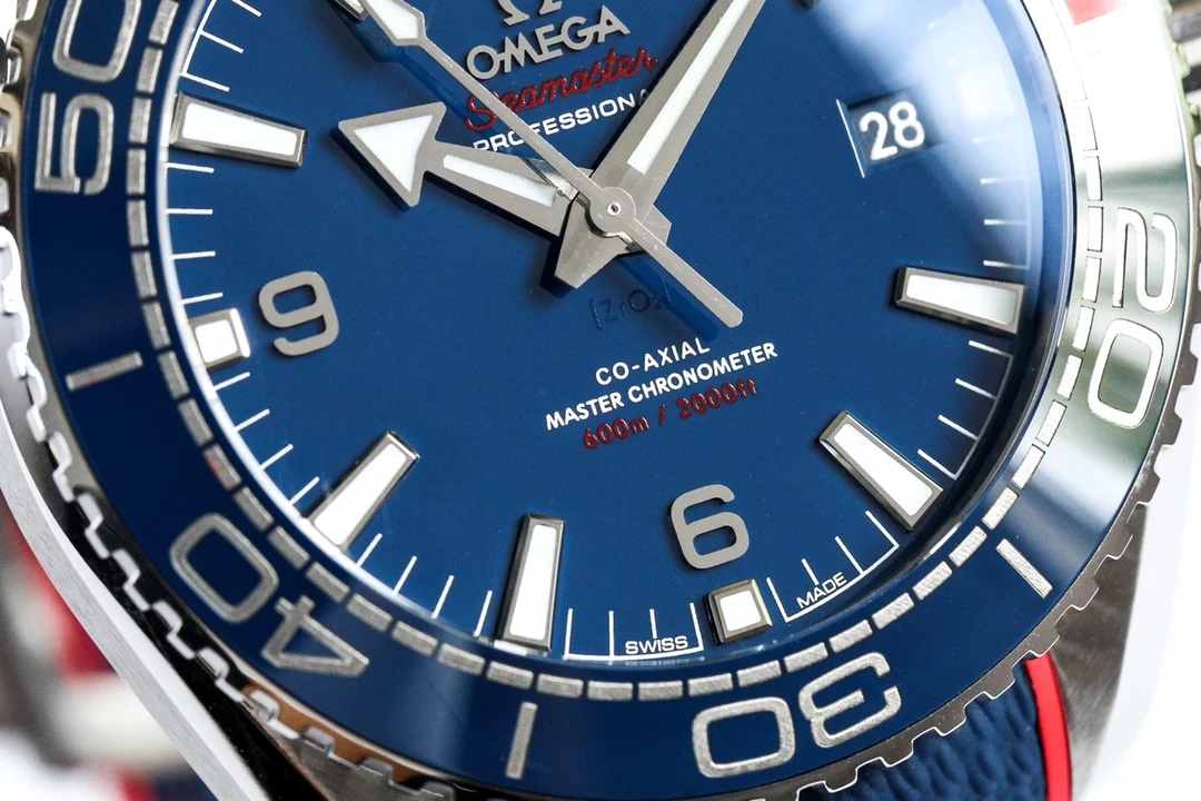 Omega Seamaster Planet Ocean Pepsi Ceramic Blue Dial 43.5mm — photographed off the sweep