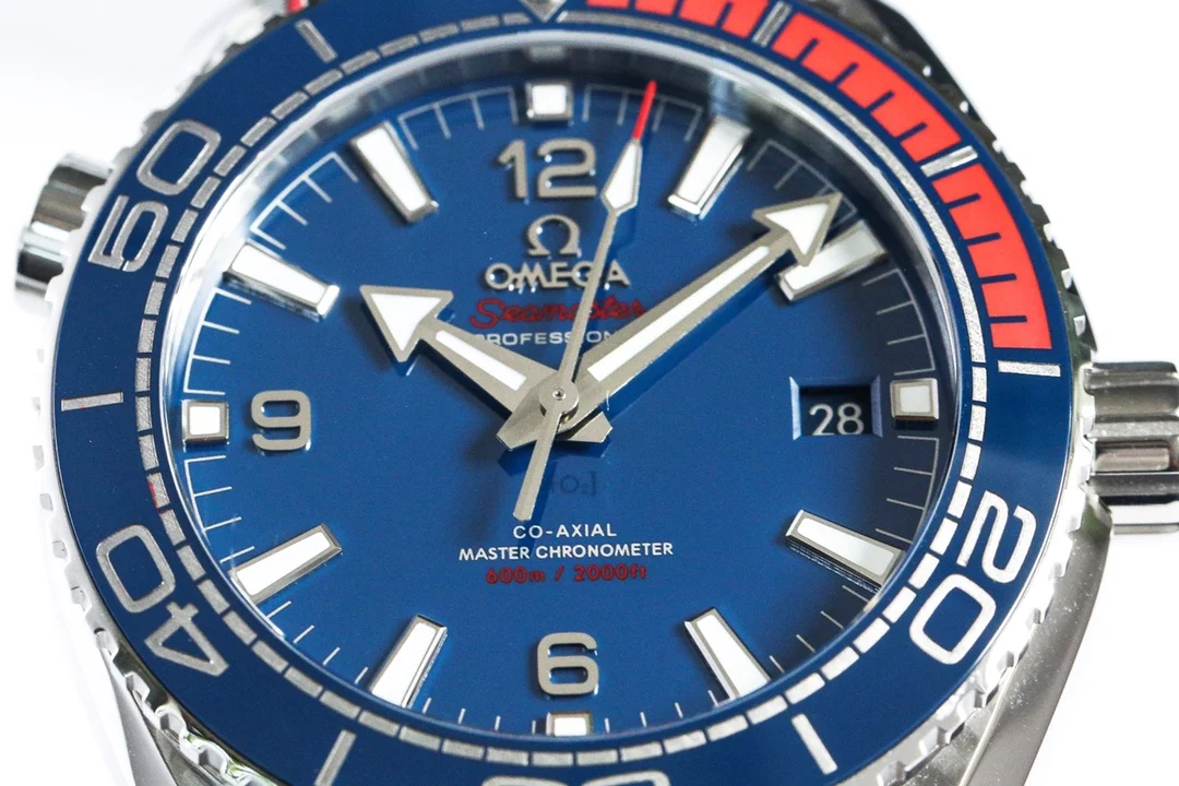 Omega Seamaster Planet Ocean Pepsi Ceramic Blue Dial 43.5mm — photographed off the sweep