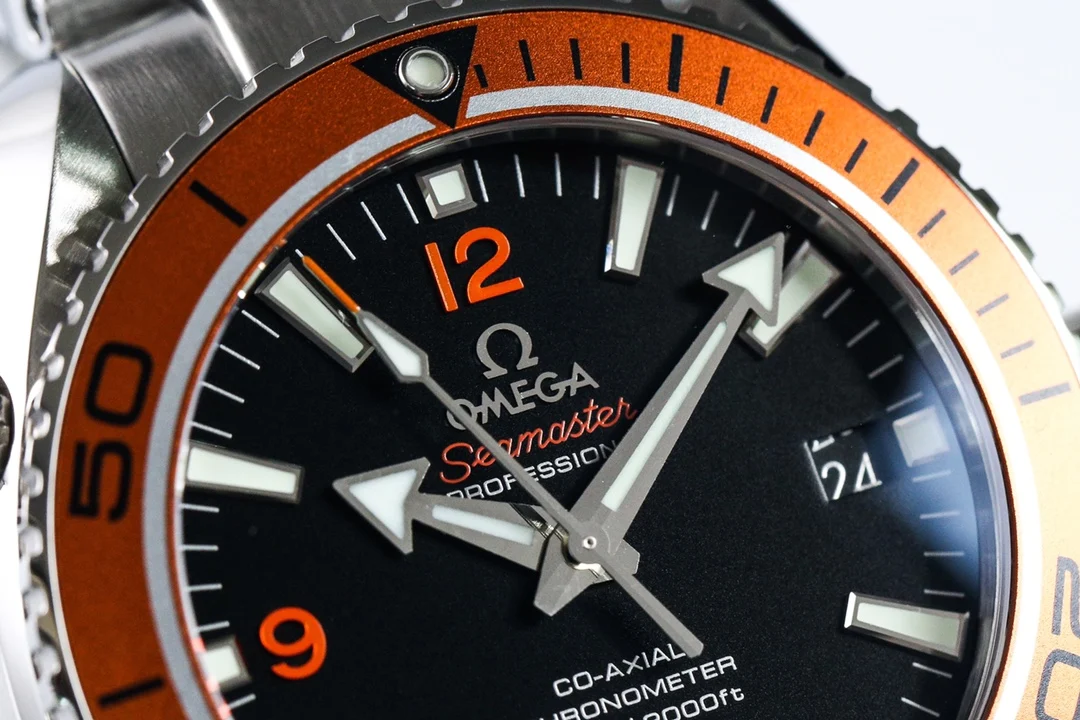 Omega Seamaster Planet Ocean Steel Orange Dial 42mm — photographed off the sweep
