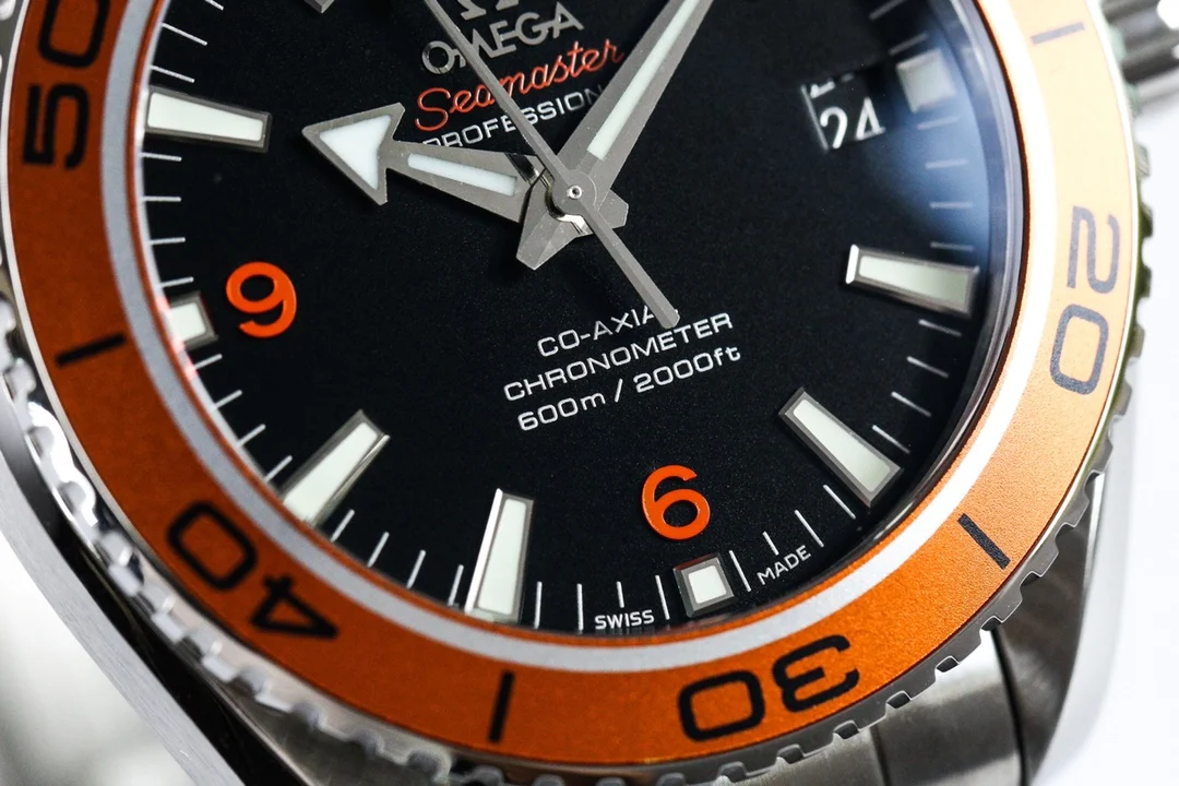Omega Seamaster Planet Ocean Steel Orange Dial 42mm — photographed off the sweep