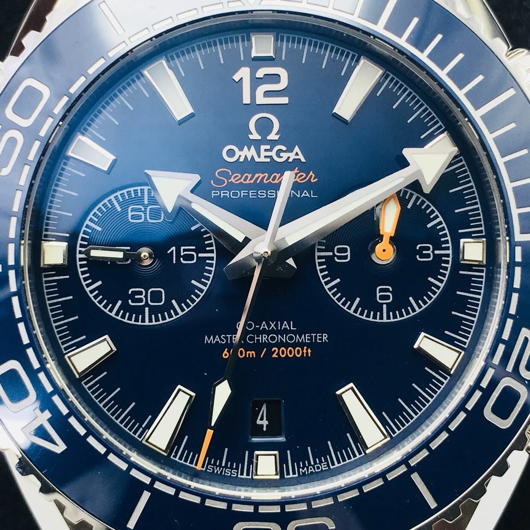 Omega Seamaster Planet Ocean Steel Orange Dial 45.50mm — photographed off the sweep