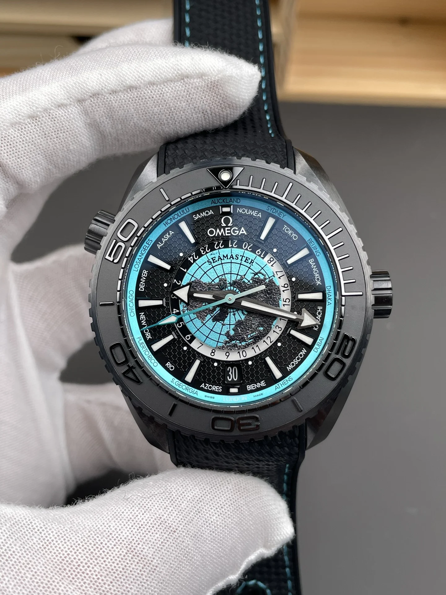 Omega Seamaster Planet Ocean World Time Tiffany — photographed off the sweep