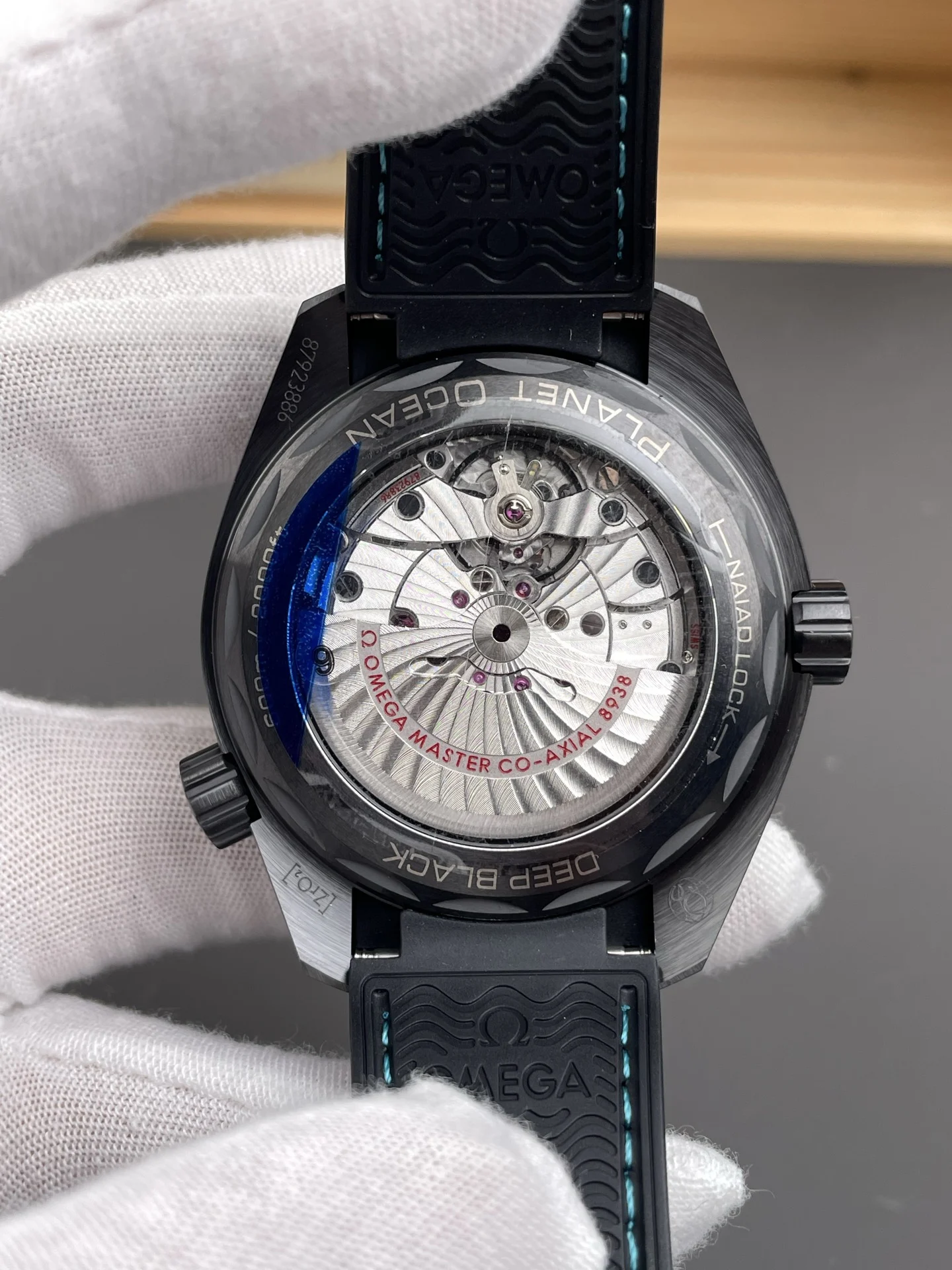 Omega Seamaster Planet Ocean World Time Tiffany — photographed off the sweep