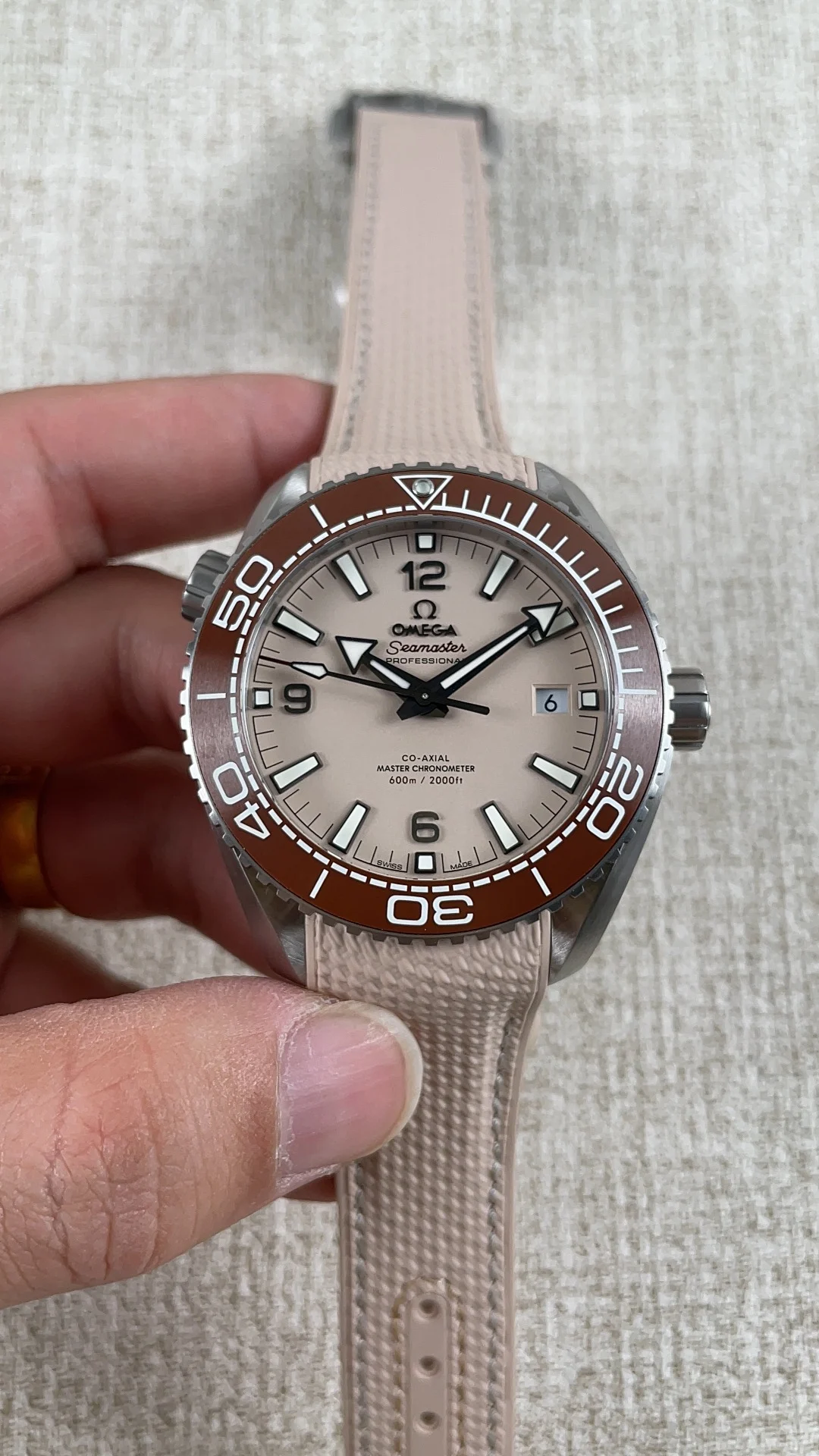 Omega Seamaster Planet Ocean Yellow Dial — photographed off the sweep