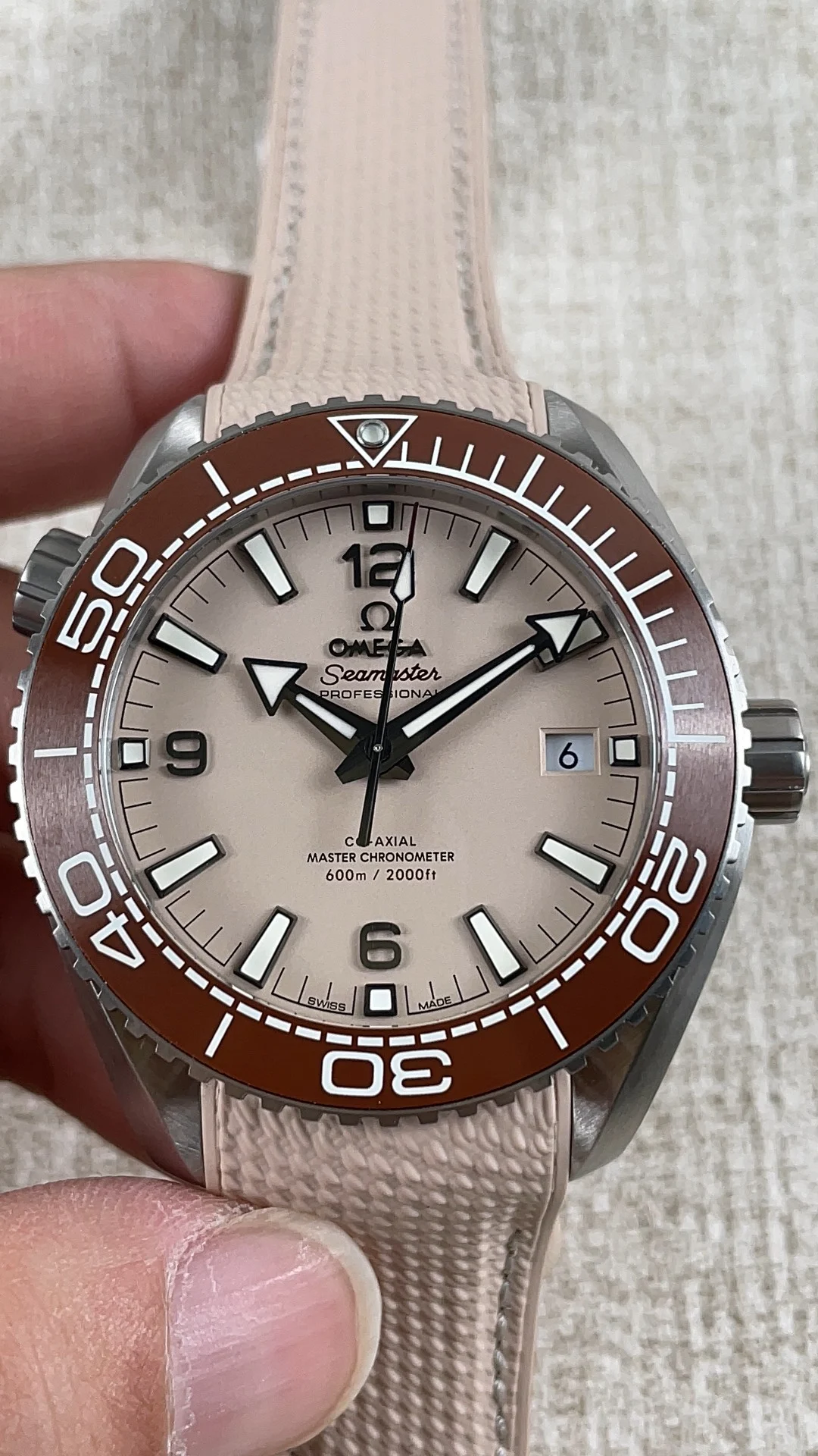 Omega Seamaster Planet Ocean Yellow Dial — photographed off the sweep