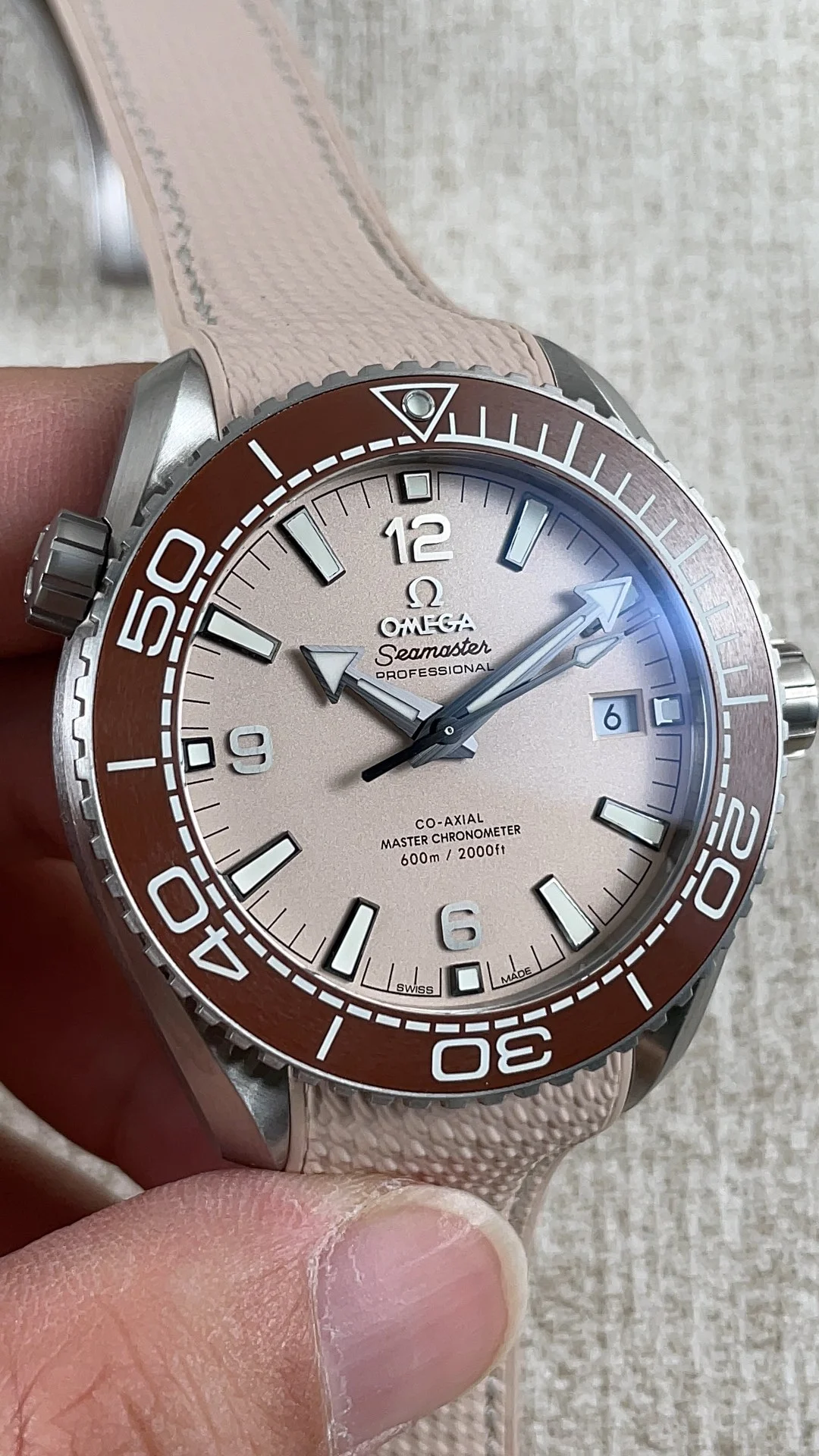 Omega Seamaster Planet Ocean Yellow Dial — photographed off the sweep