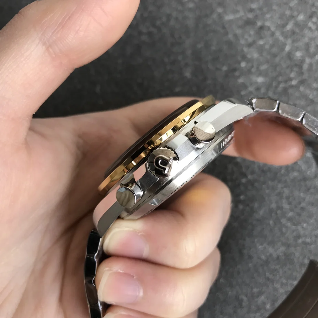 Omega Speedmaster Moonwatch Yellow Gold Black Dial — photographed off the sweep