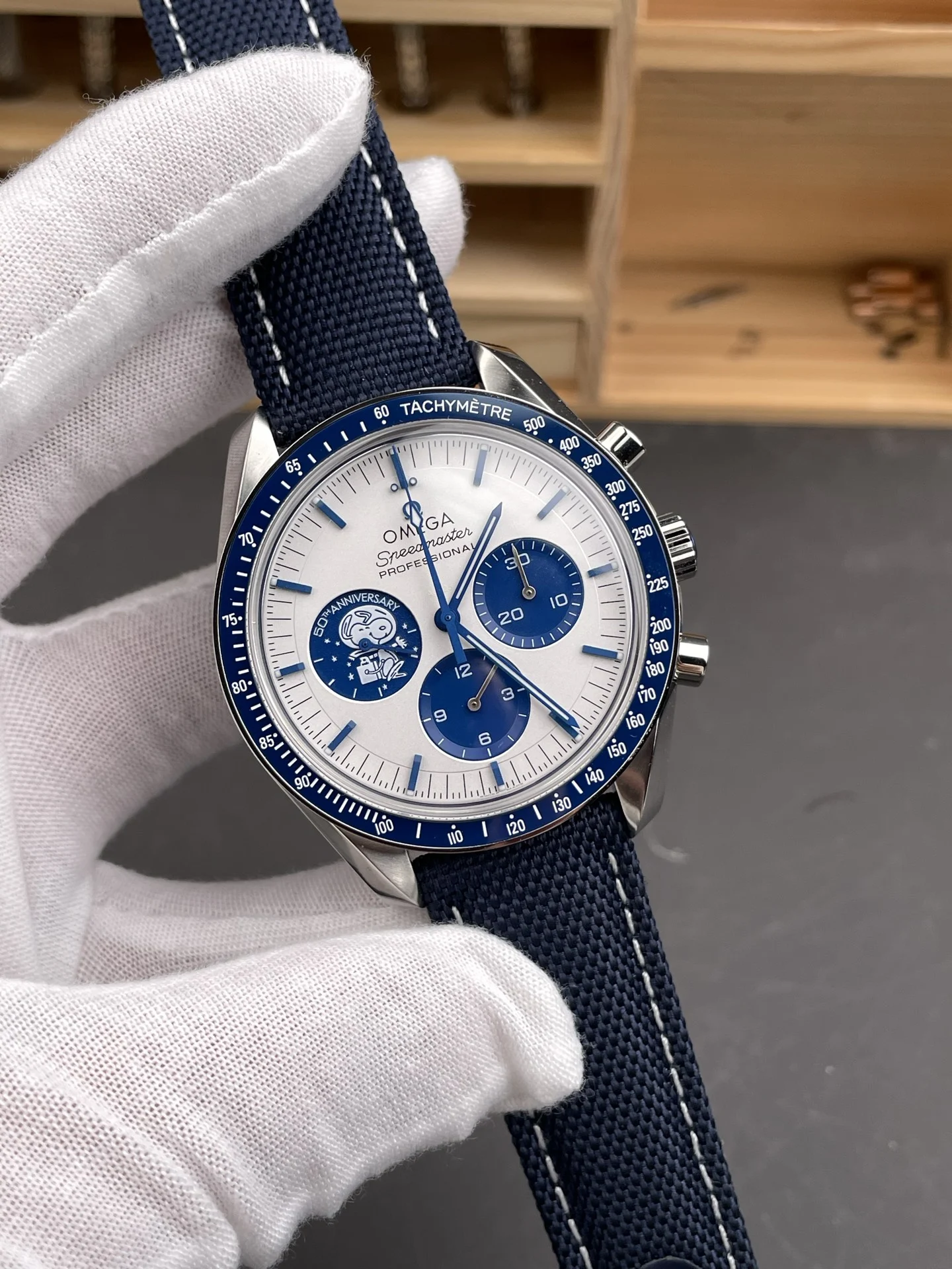 Omega Speedmaster Snoopy 42mm — photographed off the sweep