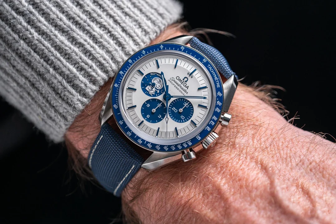 Omega Speedmaster Snoopy Ceramic Blue Dial 42mm — photographed off the sweep