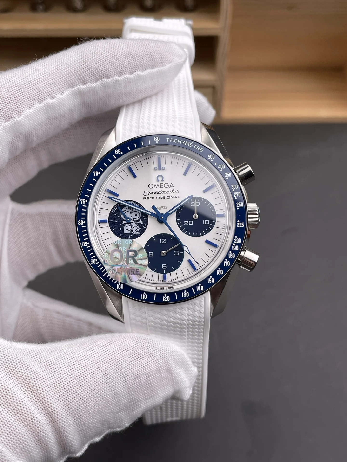 Omega Speedmaster Snoopy Ceramic Blue Dial 42mm — photographed off the sweep