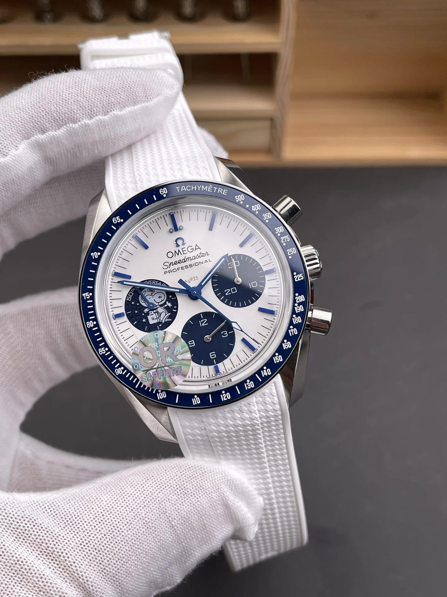 Omega Speedmaster Snoopy Ceramic Blue Dial 42mm — photographed off the sweep