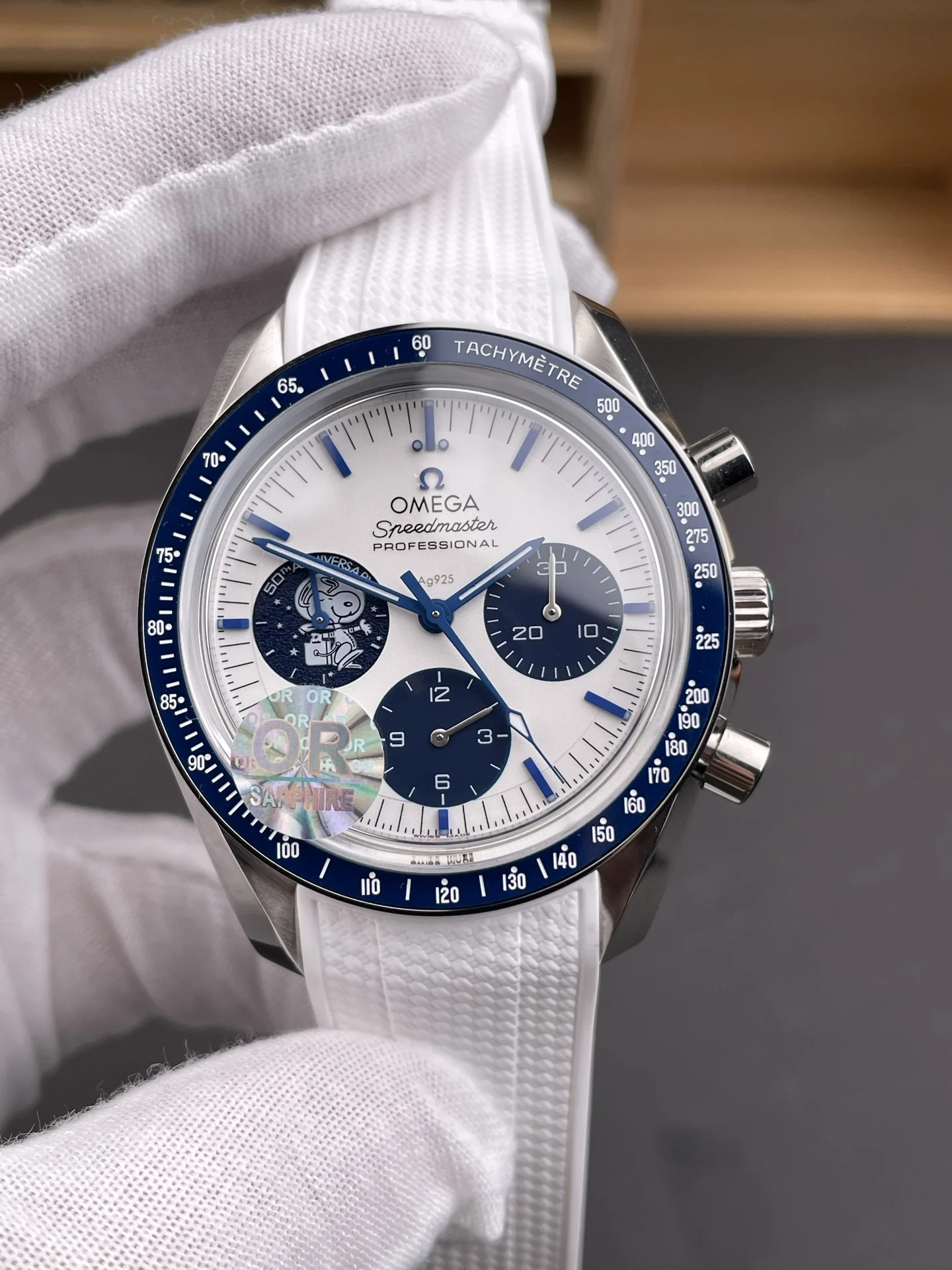 Omega Speedmaster Snoopy Ceramic Blue Dial 42mm — photographed off the sweep