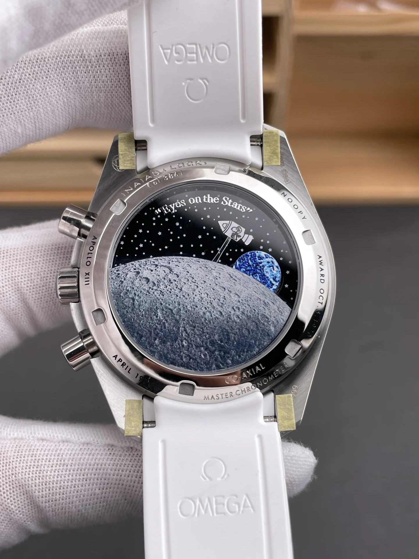 Omega Speedmaster Snoopy Ceramic Blue Dial 42mm — photographed off the sweep