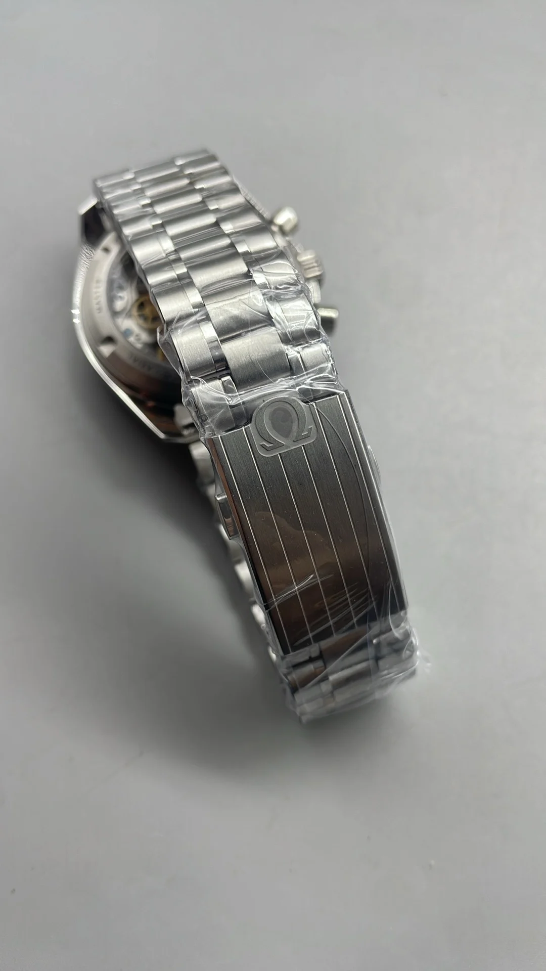 Omega Speedmaster White Dial — photographed off the sweep