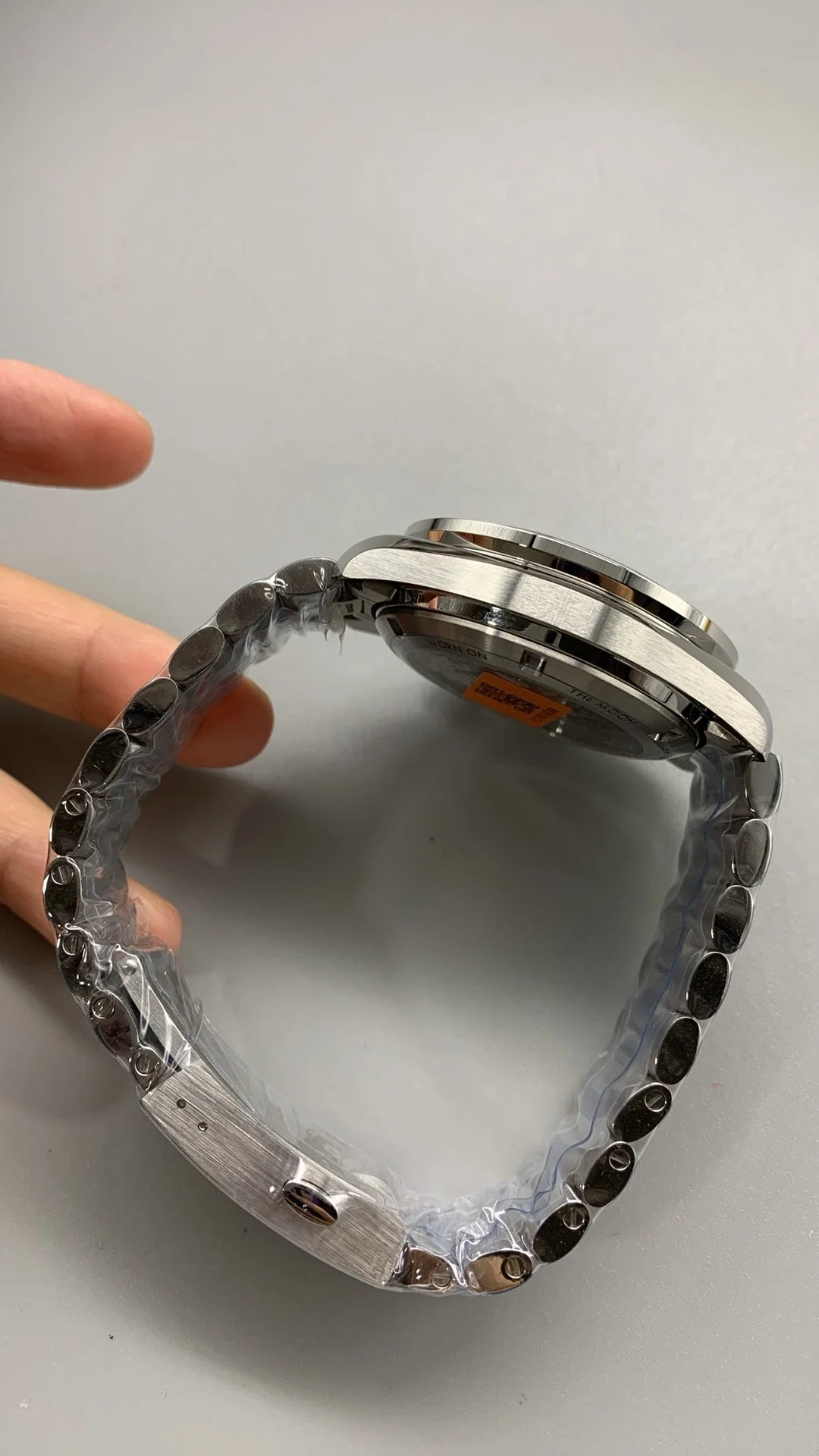 Omega Speedmaster White Dial — photographed off the sweep