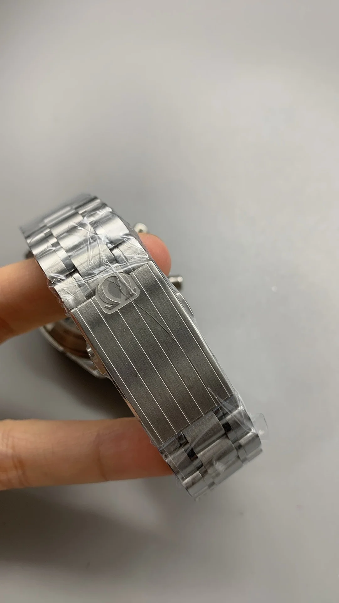 Omega Speedmaster White Dial — photographed off the sweep