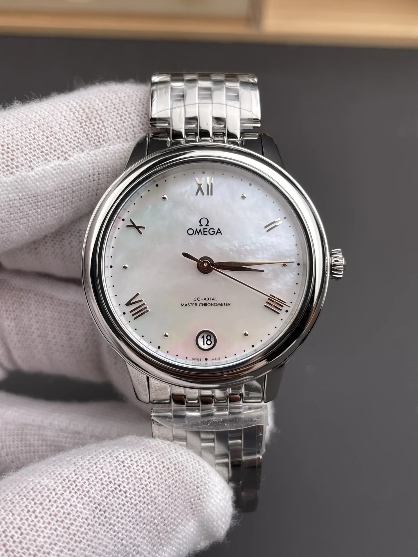 Omega White Dial 34mm — photographed off the sweep