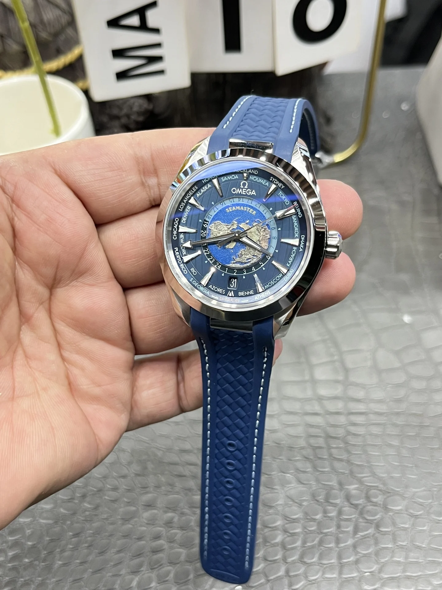 Omega World Time 43mm — photographed off the sweep