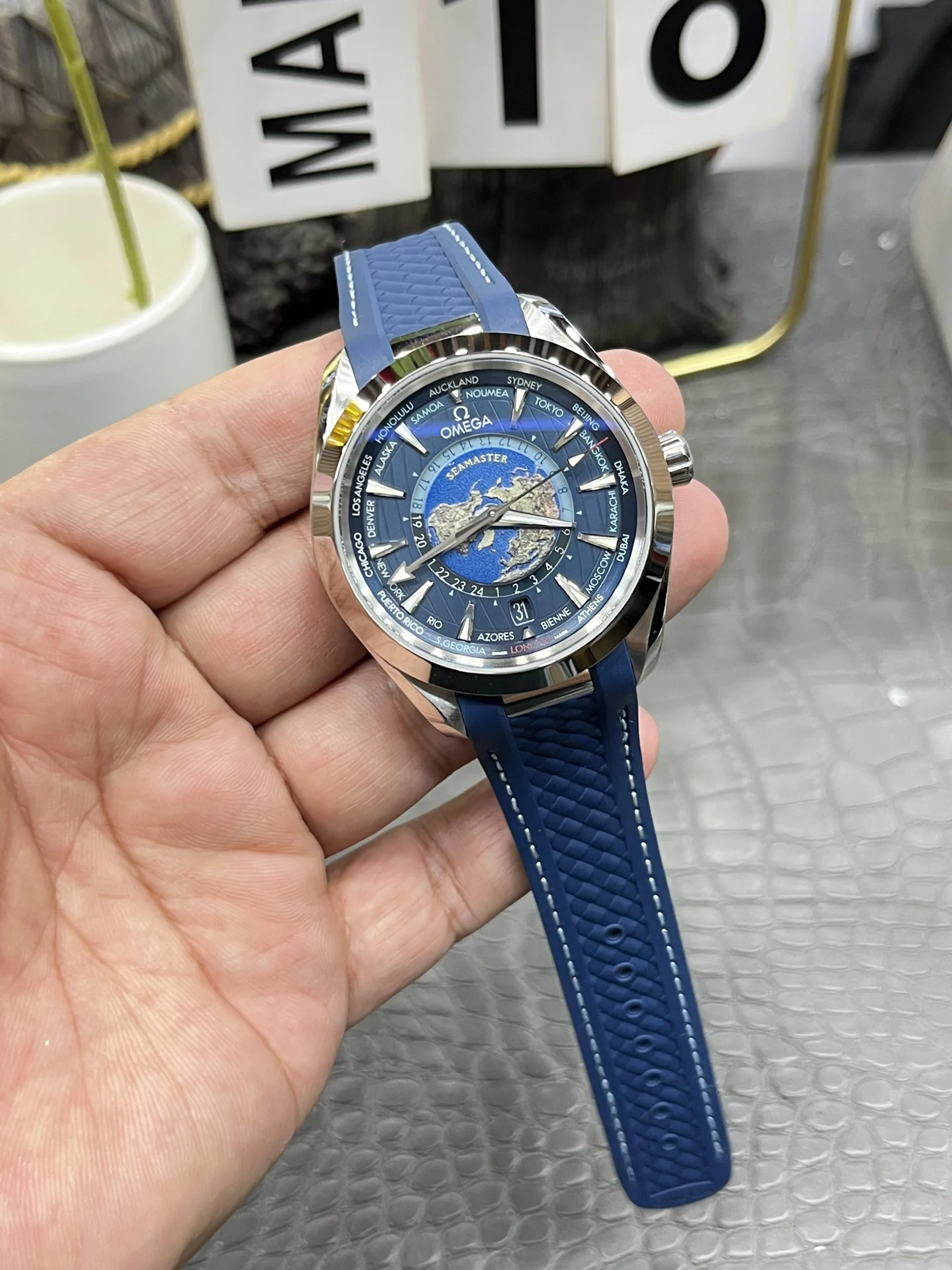 Omega World Time 43mm — photographed off the sweep