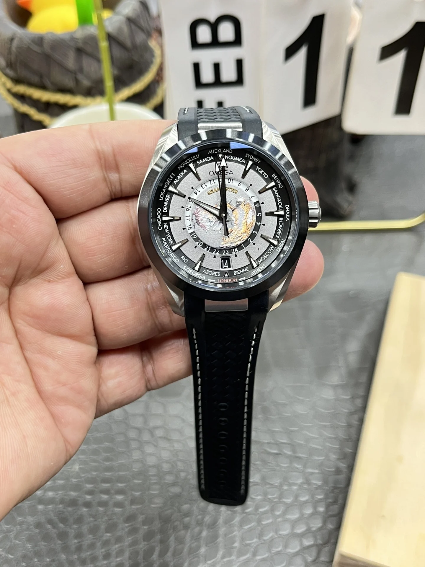 Omega World Time Ceramic — photographed off the sweep