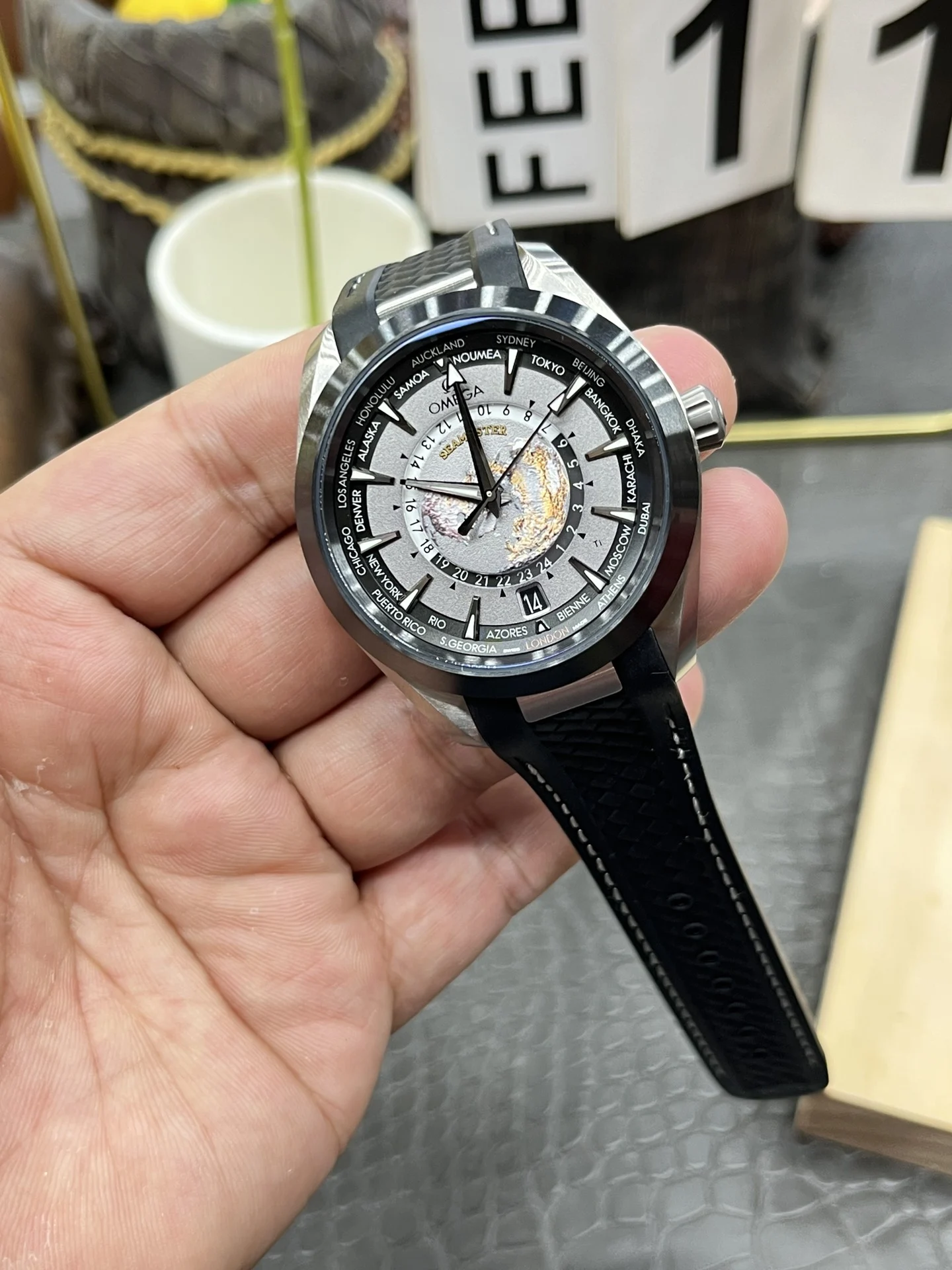 Omega World Time Ceramic — photographed off the sweep